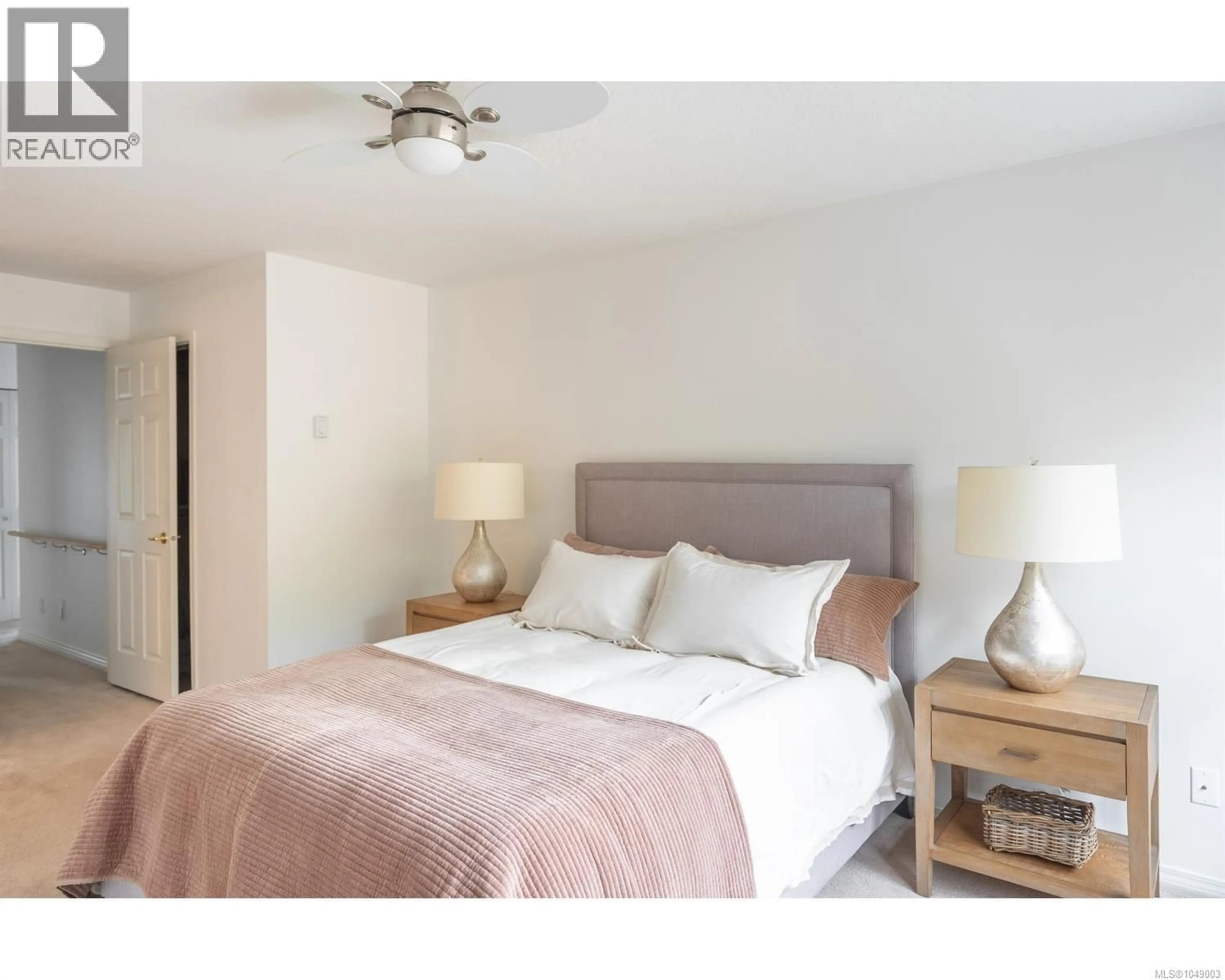Bedroom with bed, wood/laminate floor for 20 - 450 BAY AVENUE, Parksville British Columbia V9P2K2