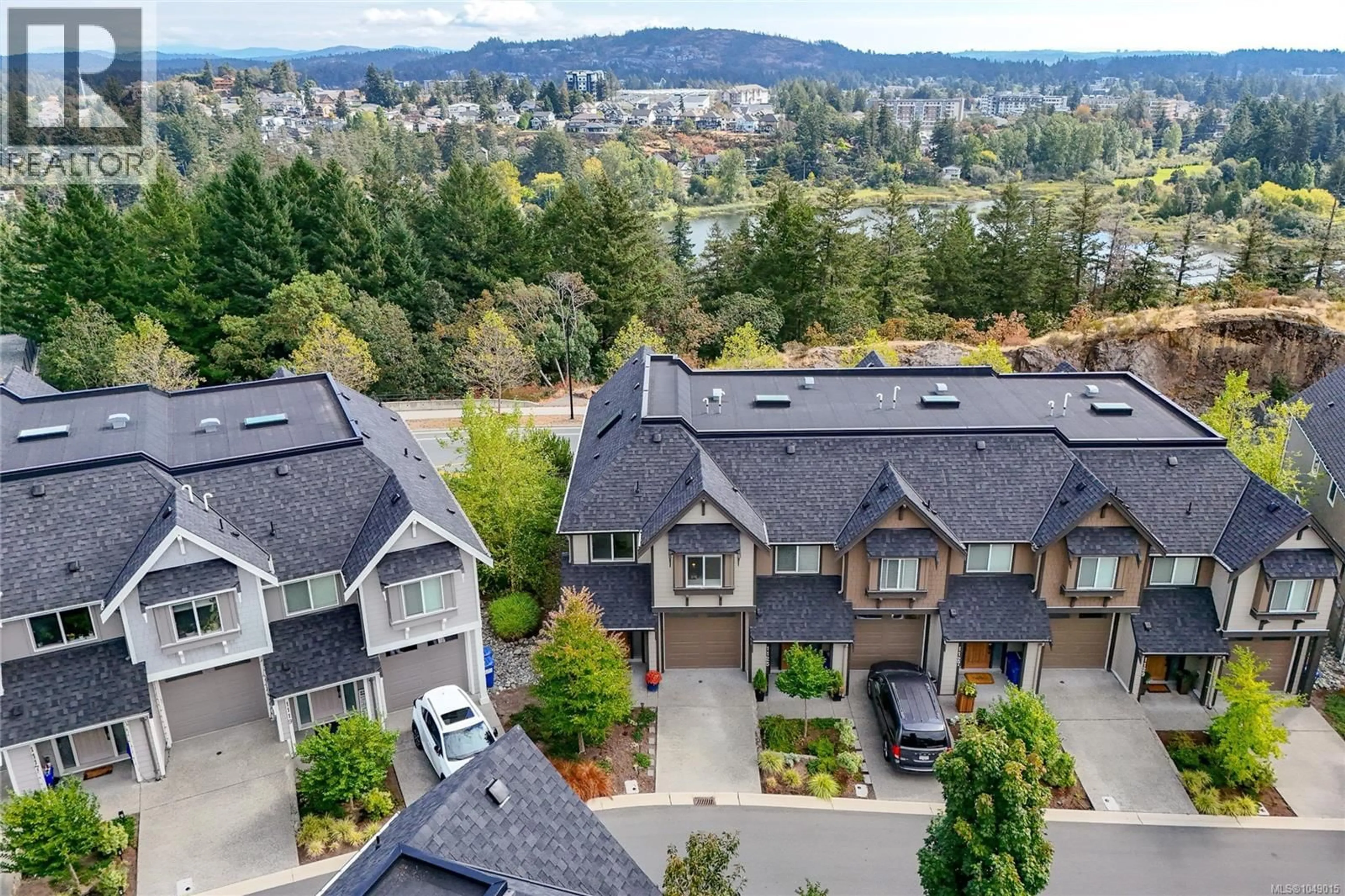 A pic from outside/outdoor area/front of a property/back of a property/a pic from drone, mountain view for 1123 MOONSTONE LOOP, Langford British Columbia V9B0Y6