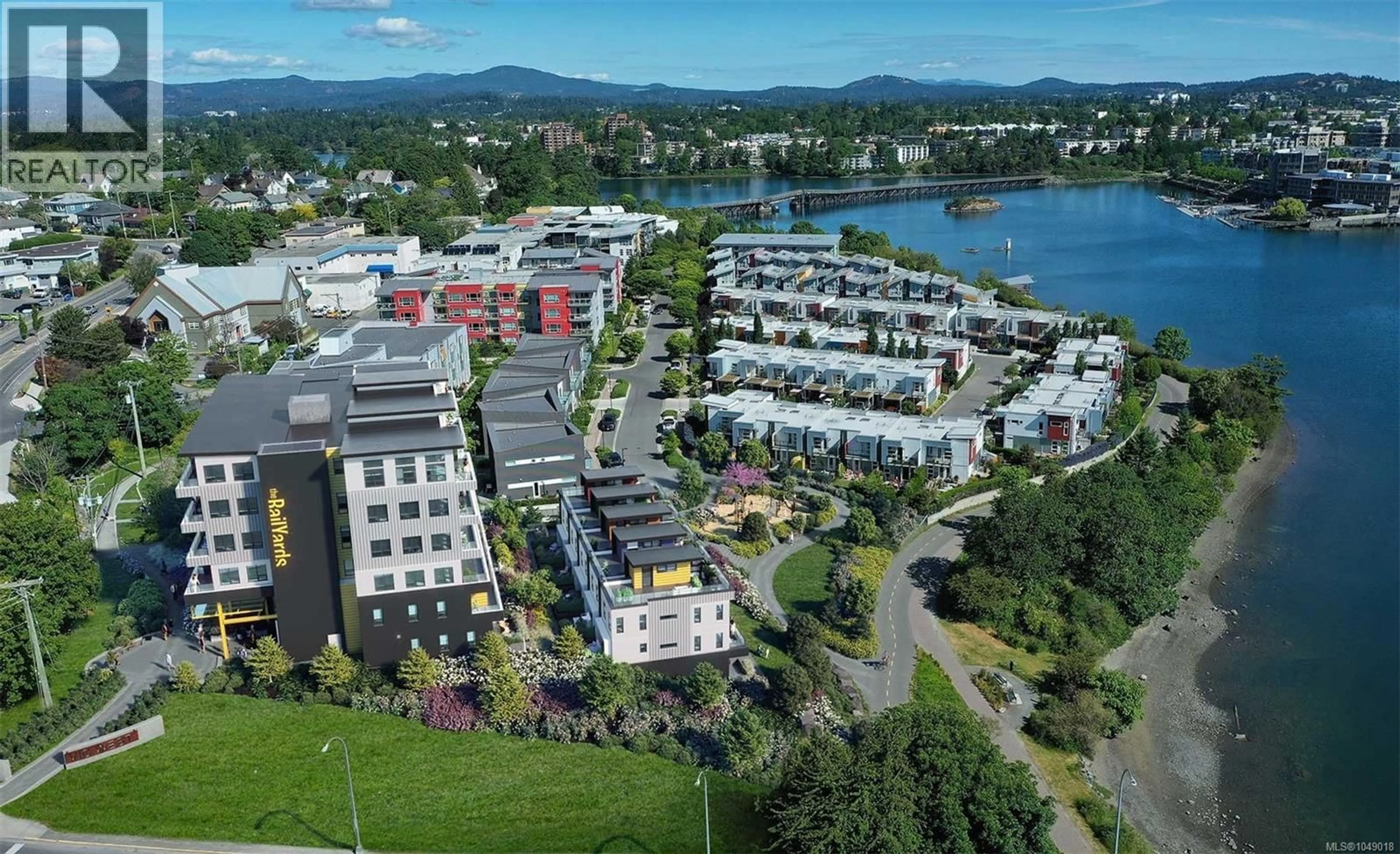 A pic from outside/outdoor area/front of a property/back of a property/a pic from drone, unknown for 103 - 785 TYEE ROAD, Victoria British Columbia V9A7R5
