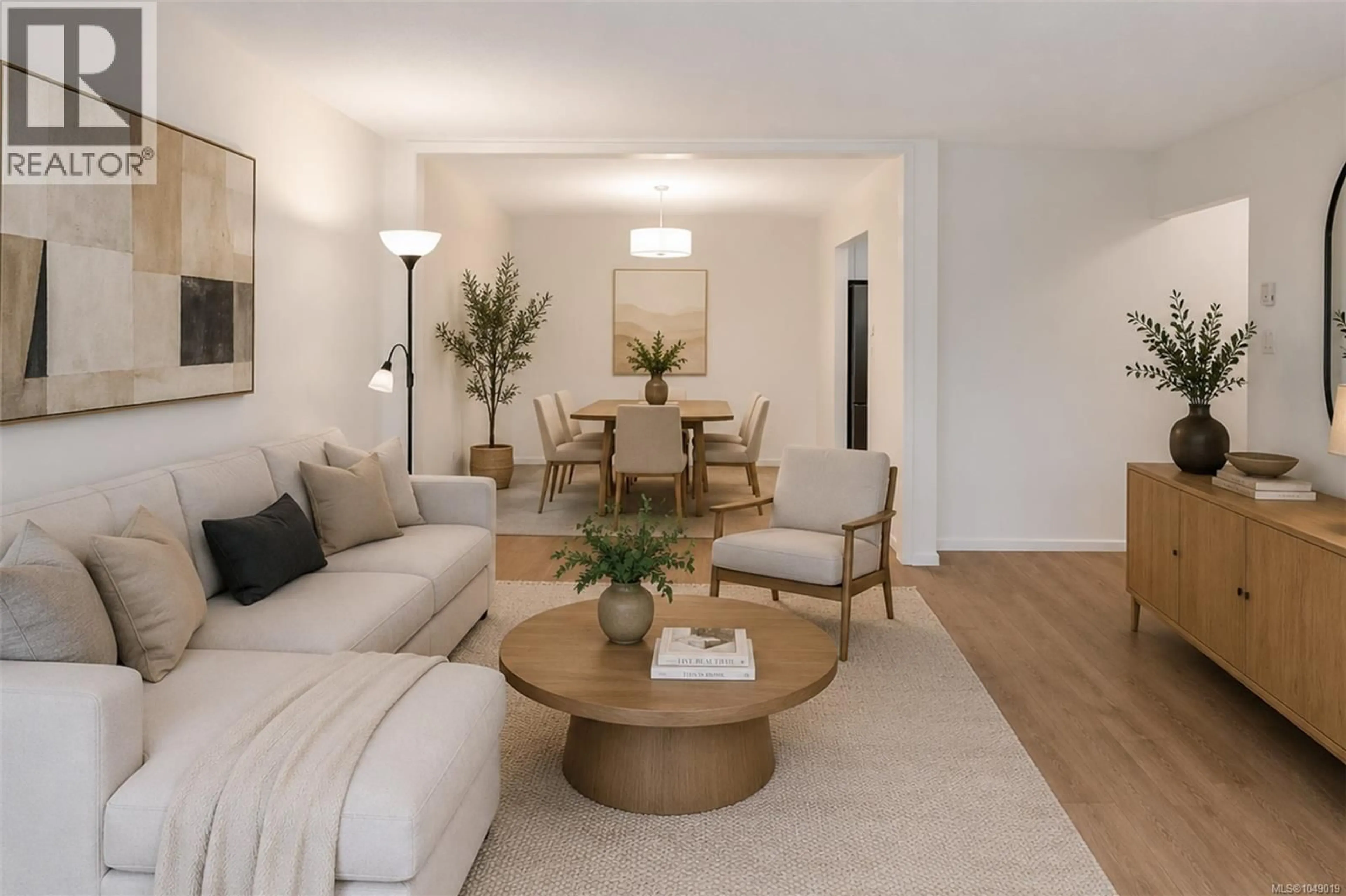 Living room with furniture, wood/laminate floor for 202 - 1419 STADACONA AVENUE, Victoria British Columbia V8S5J3