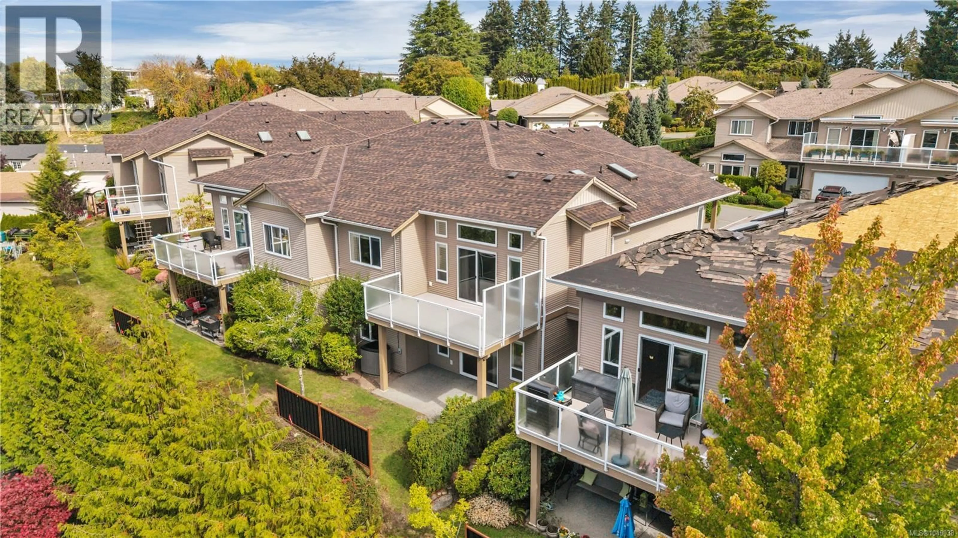 A pic from outside/outdoor area/front of a property/back of a property/a pic from drone, unknown for 101 - 6245 PLEASANT RIDGE PLACE, Nanaimo British Columbia V9T0B3