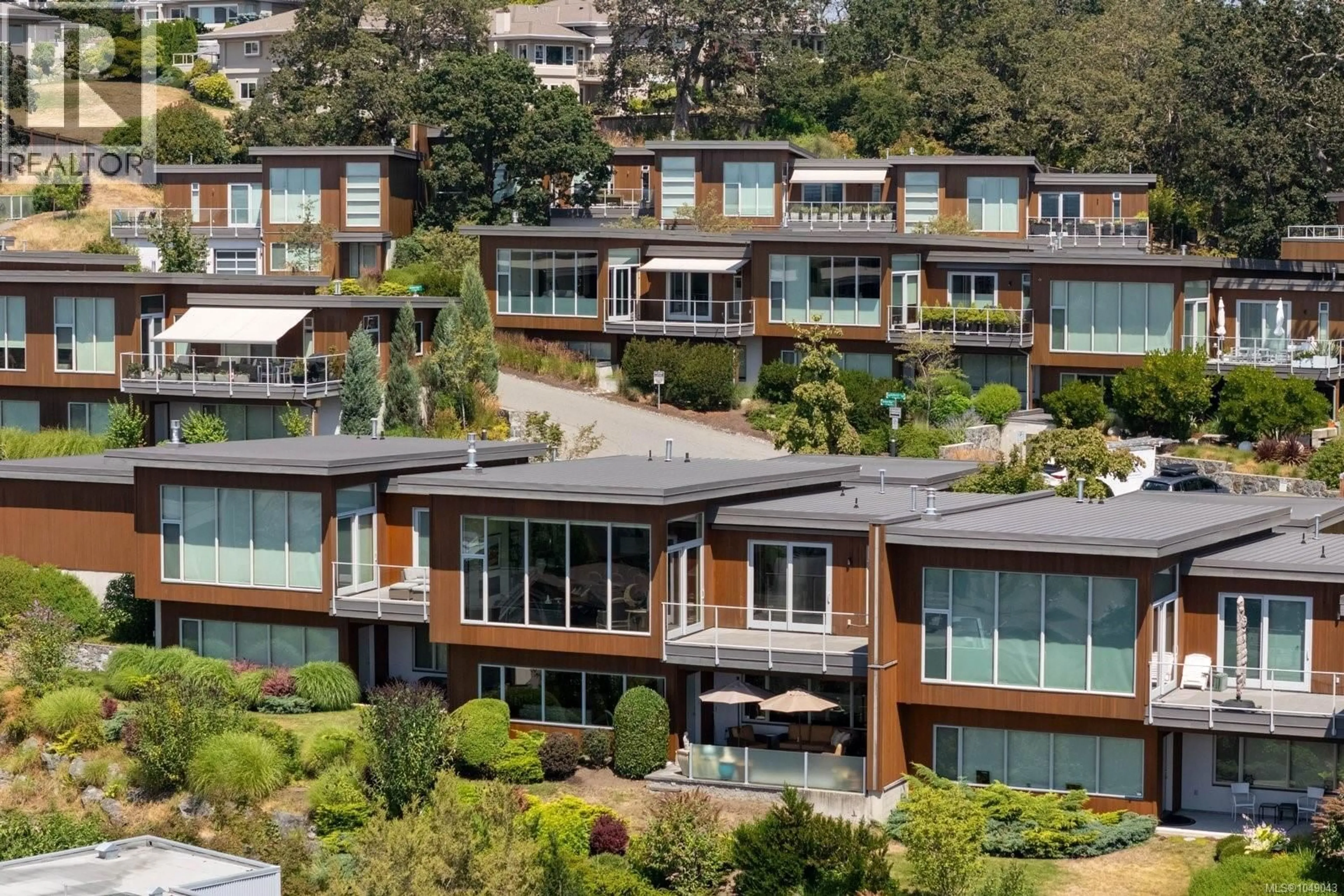 A pic from outside/outdoor area/front of a property/back of a property/a pic from drone, unknown for 4022 RAINBOW HILL LANE, Saanich British Columbia V8X0A6
