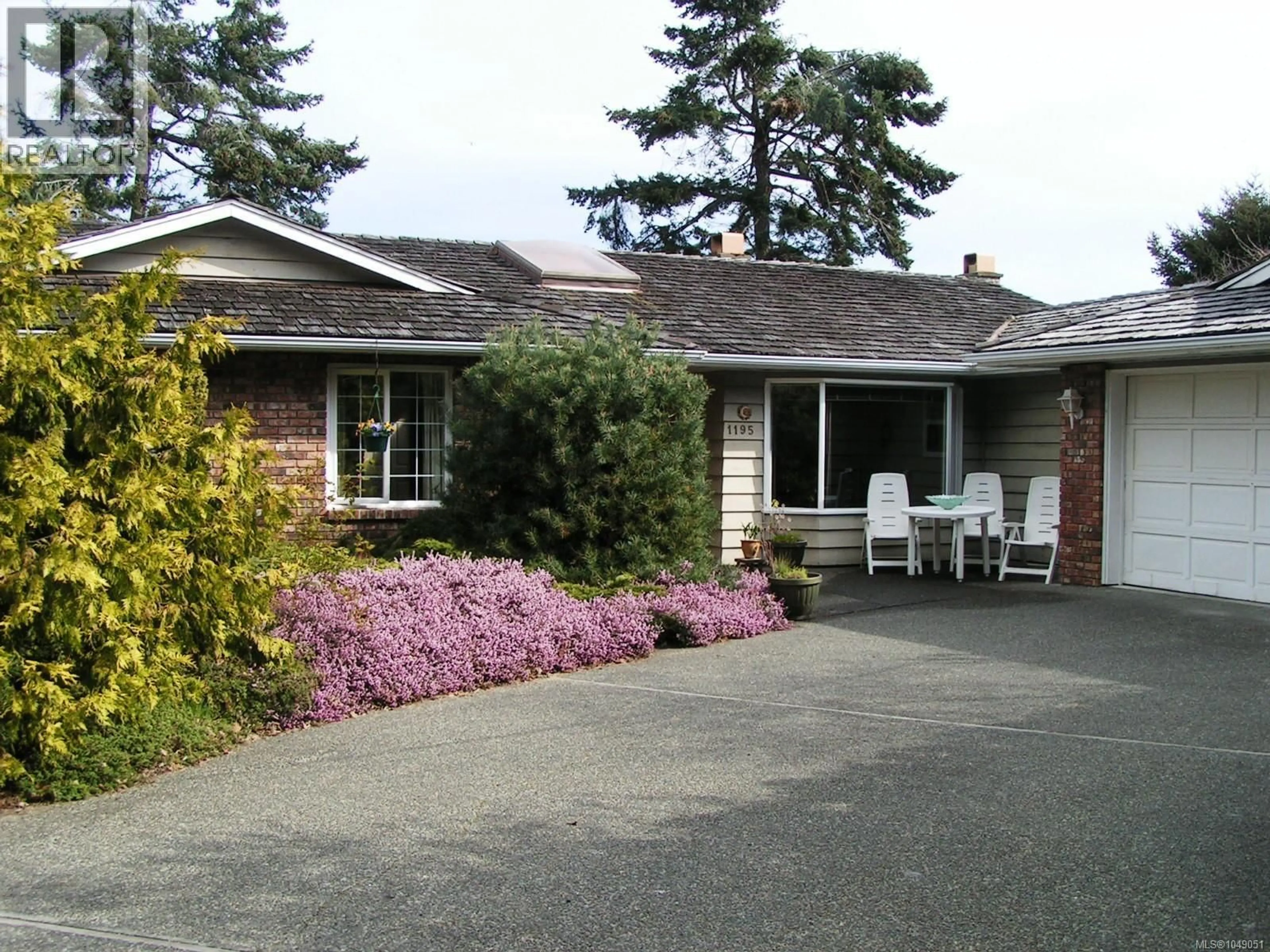 A pic from outside/outdoor area/front of a property/back of a property/a pic from drone, street for 1195 BUTTERBALL DRIVE, Qualicum Beach British Columbia V9K1C7