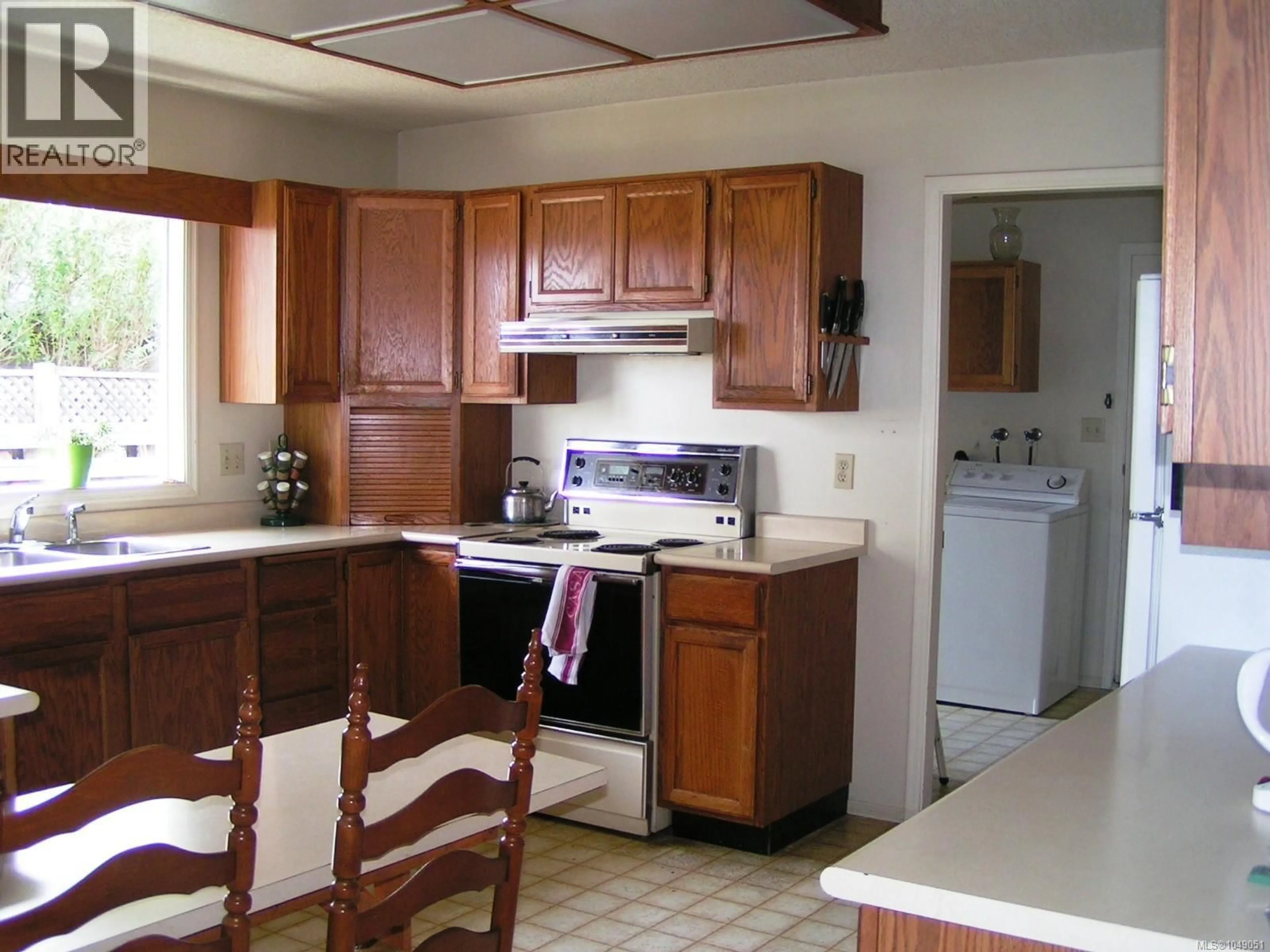 Standard kitchen, ceramic/tile floor for 1195 BUTTERBALL DRIVE, Qualicum Beach British Columbia V9K1C7