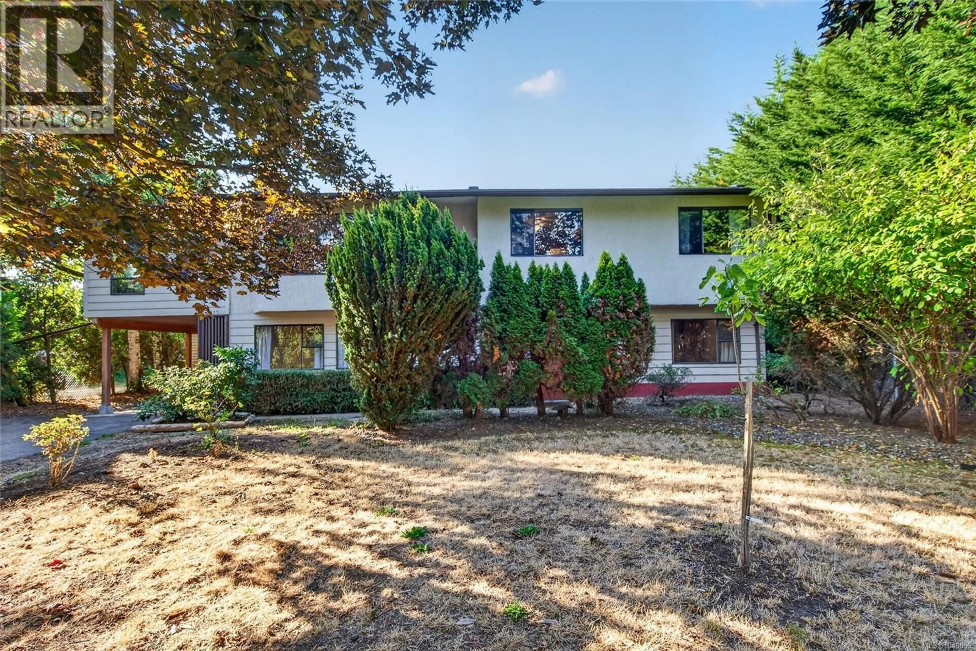 A pic from outside/outdoor area/front of a property/back of a property/a pic from drone, street for 7115 WALLACE DRIVE, Central Saanich British Columbia V8M1G9