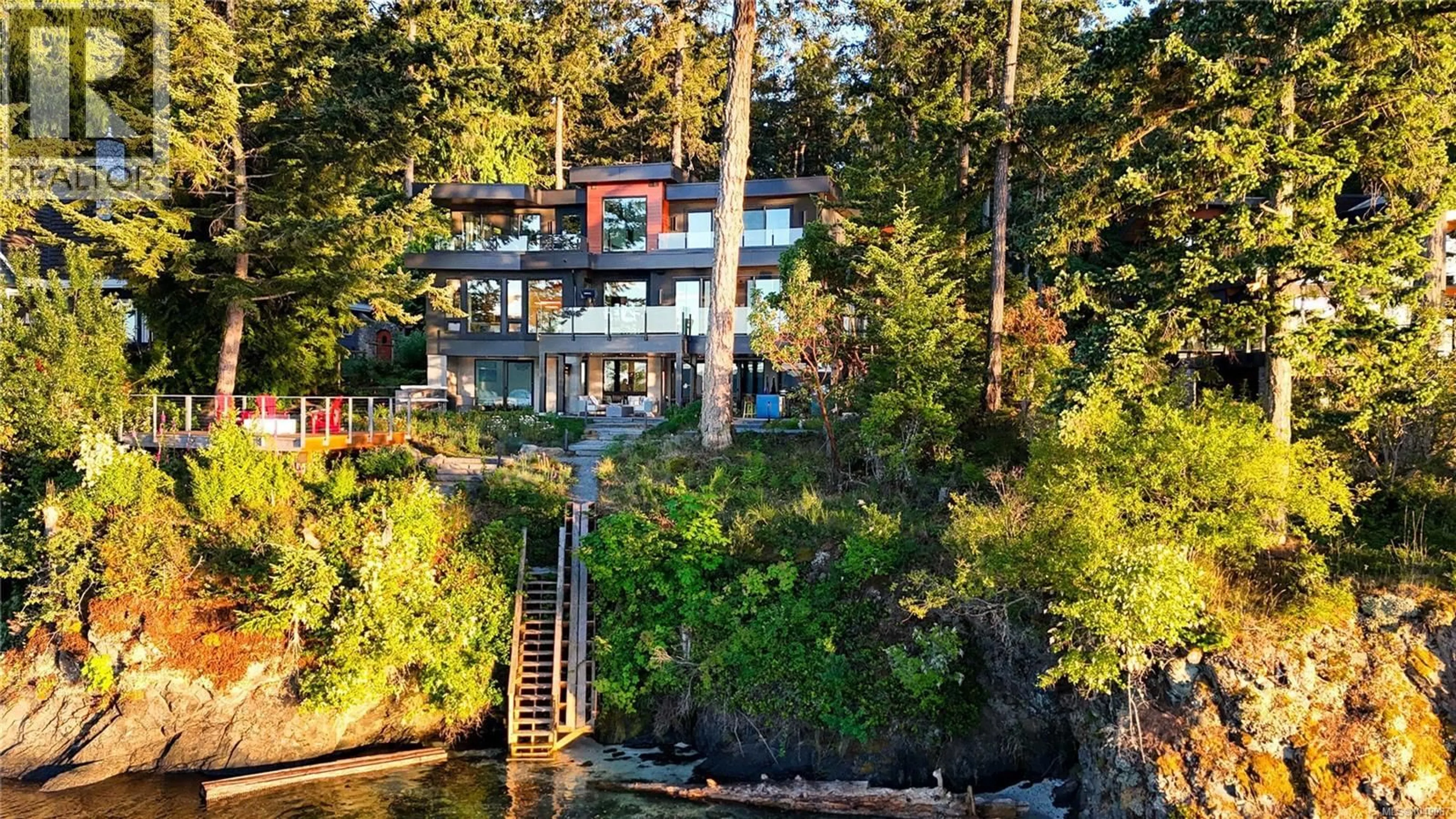 A pic from outside/outdoor area/front of a property/back of a property/a pic from drone, water/lake/river/ocean view for 848 LANDS END ROAD, North Saanich British Columbia V8L5L3