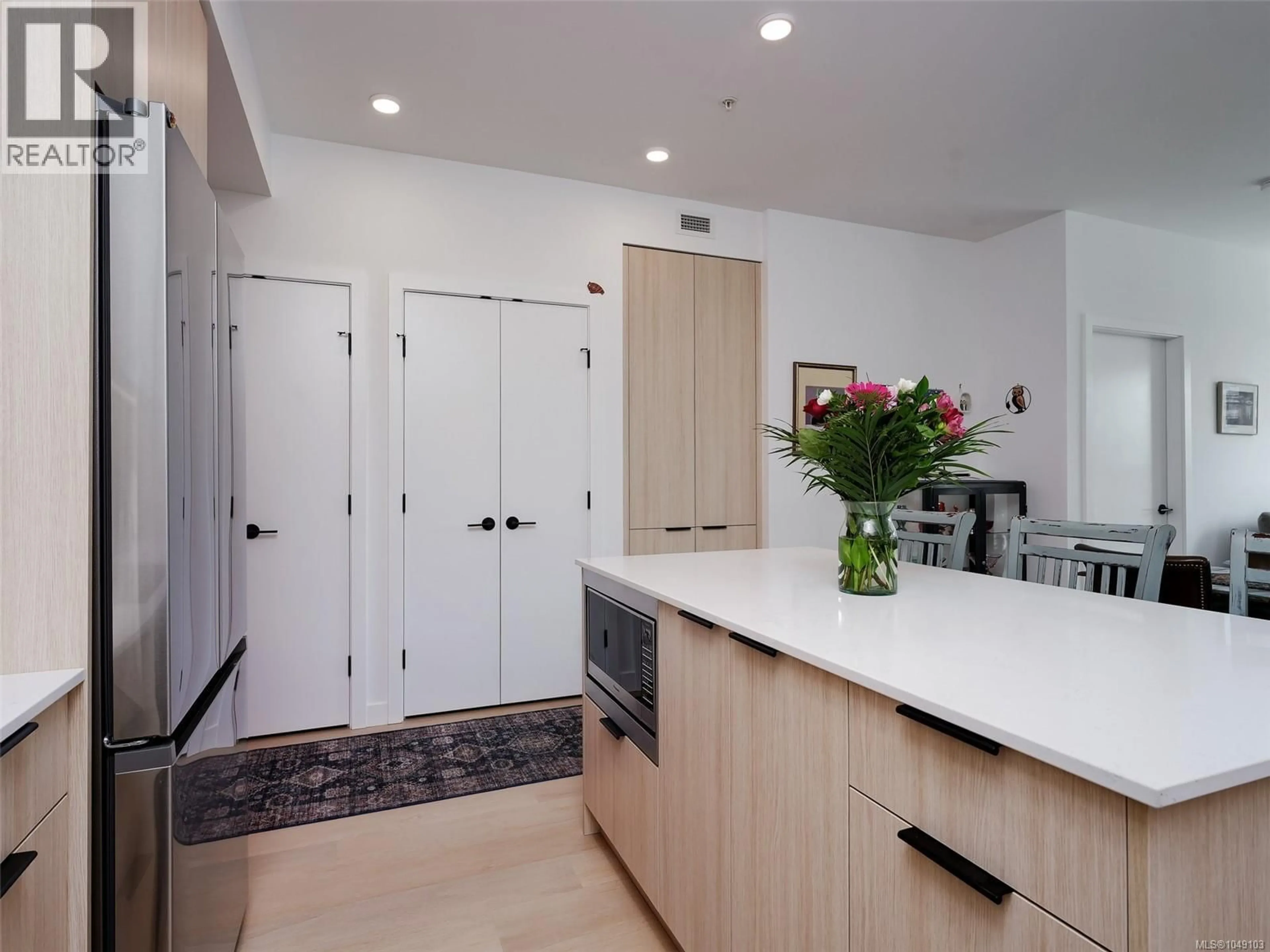 Contemporary kitchen, ceramic/tile floor for 107 - 3564B RYDER HESJEDAL WAY, Colwood British Columbia V9C0V4