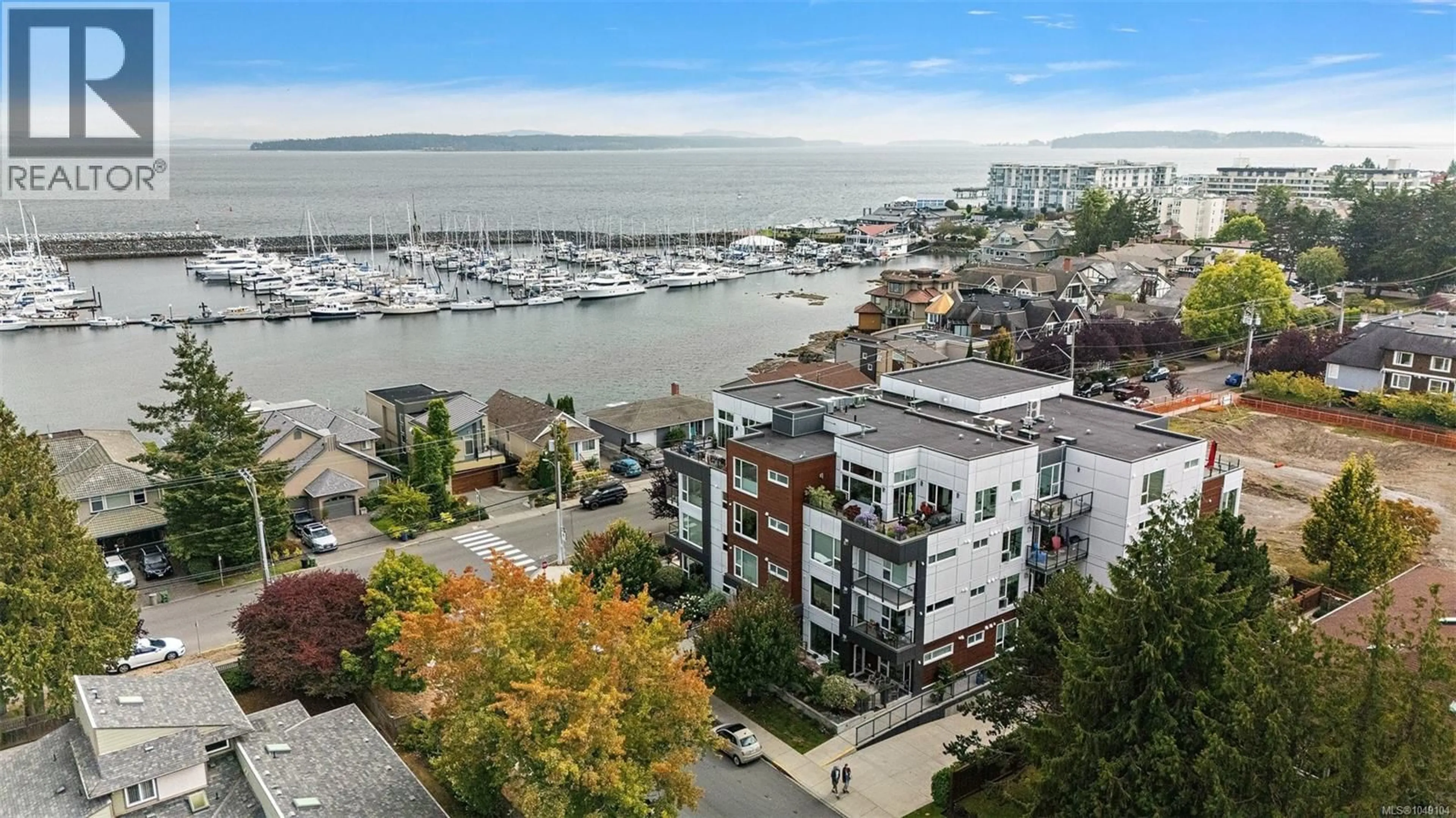 A pic from outside/outdoor area/front of a property/back of a property/a pic from drone, water/lake/river/ocean view for 101 - 2447 HENRY AVENUE, Sidney British Columbia V8L4N3