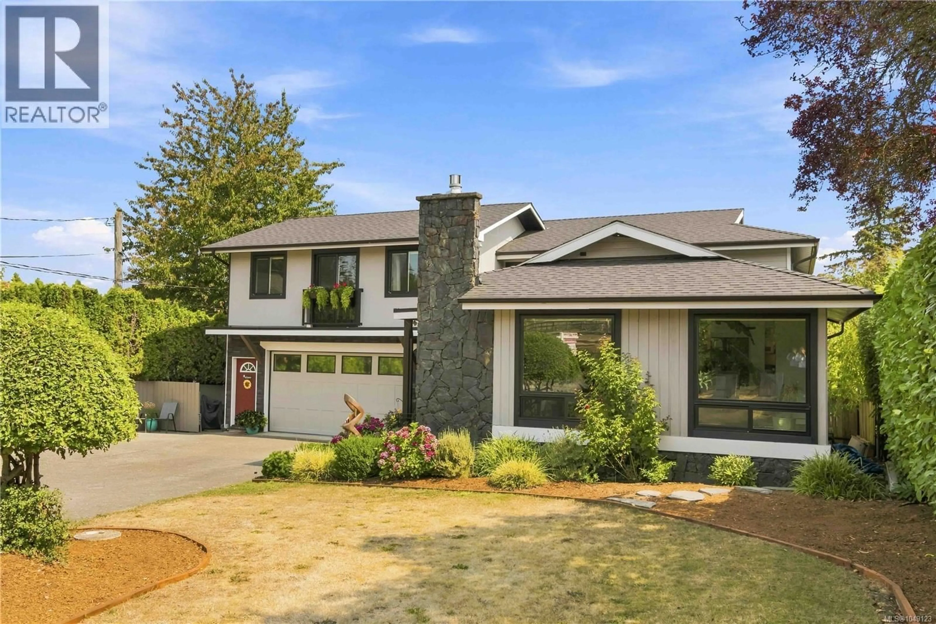 Home with brick exterior material, street for 7081 EAST SAANICH ROAD, Central Saanich British Columbia V8M1Y3