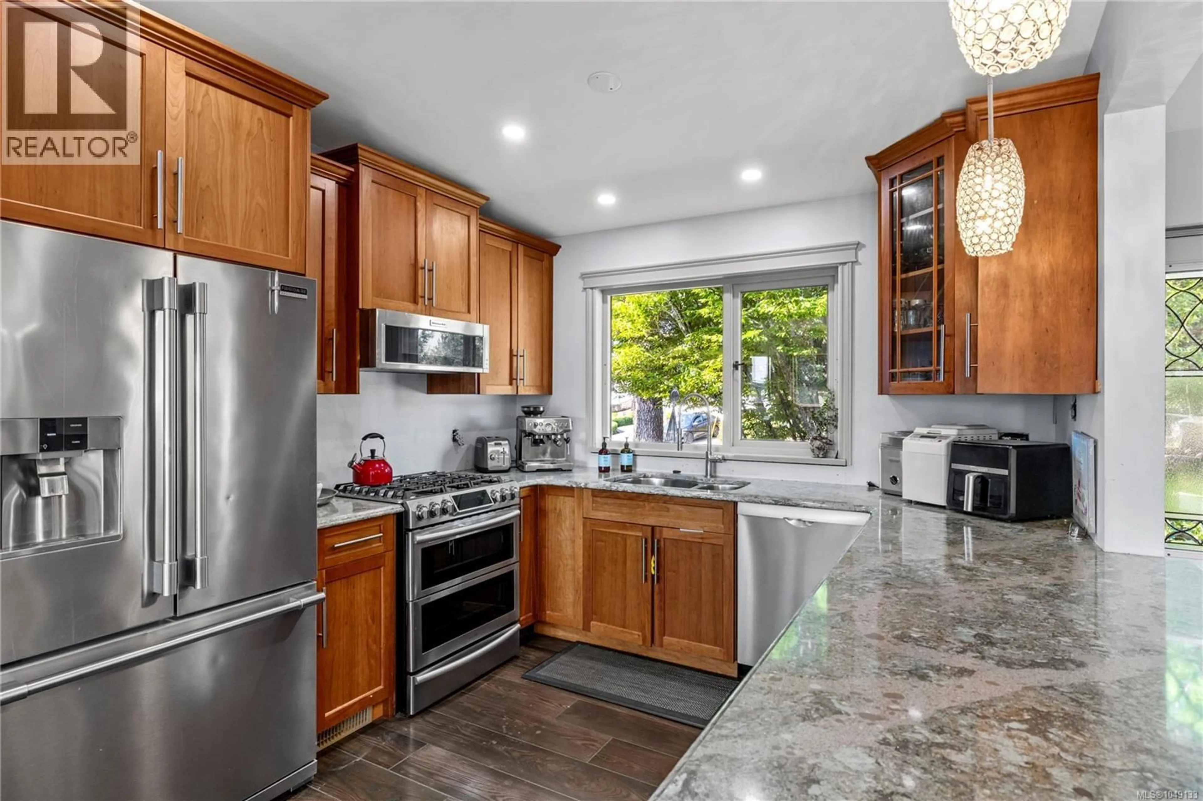Open concept kitchen, ceramic/tile floor for 396 WISTERIA STREET, Parksville British Columbia V9P1C6