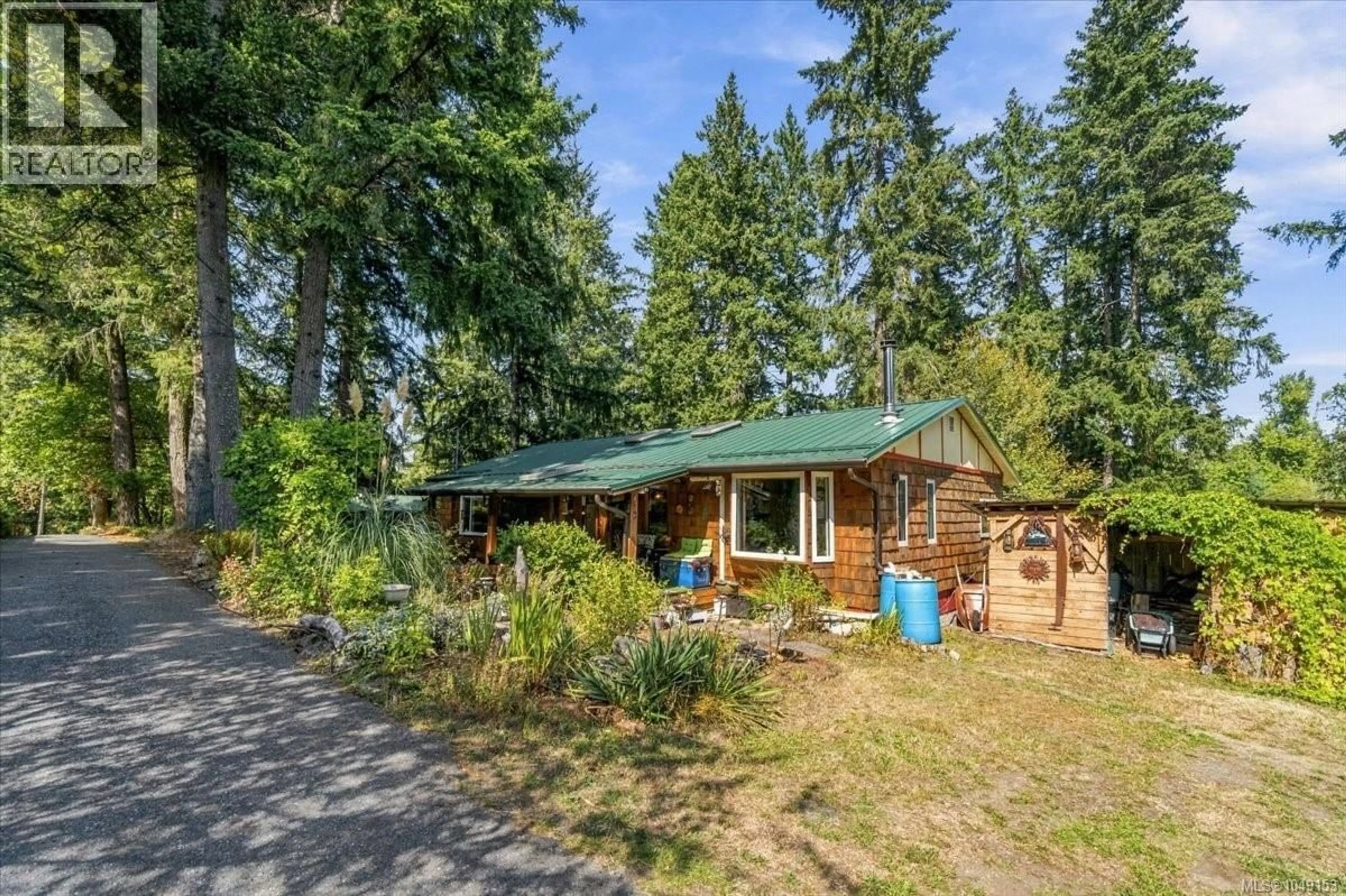 A pic from outside/outdoor area/front of a property/back of a property/a pic from drone, forest/trees view for 13545 CEDAR ROAD, Nanaimo British Columbia V9G1H5