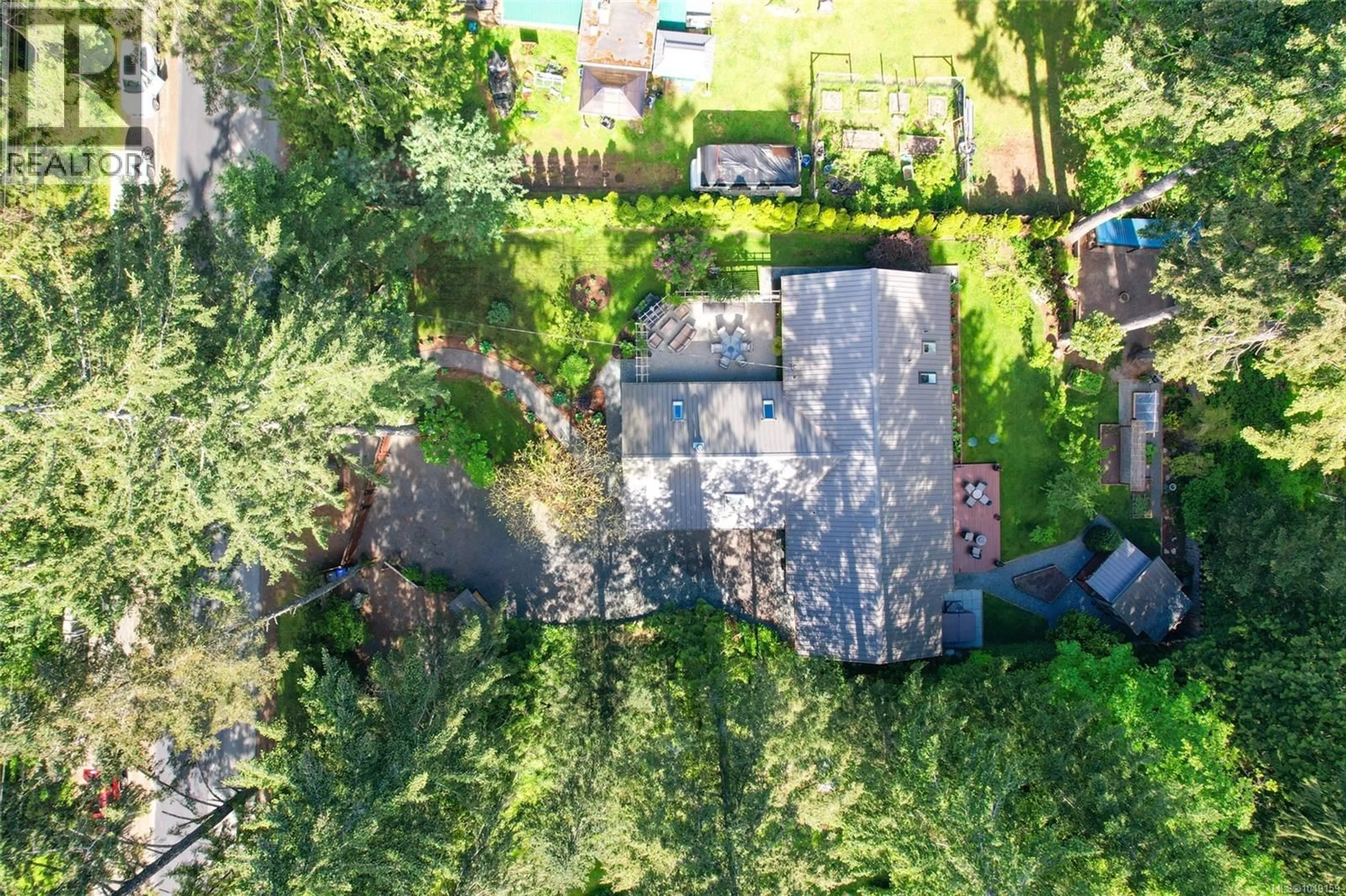 A pic from outside/outdoor area/front of a property/back of a property/a pic from drone, forest/trees view for 1126 NORTH ROAD, Gabriola Island British Columbia V0R1X3