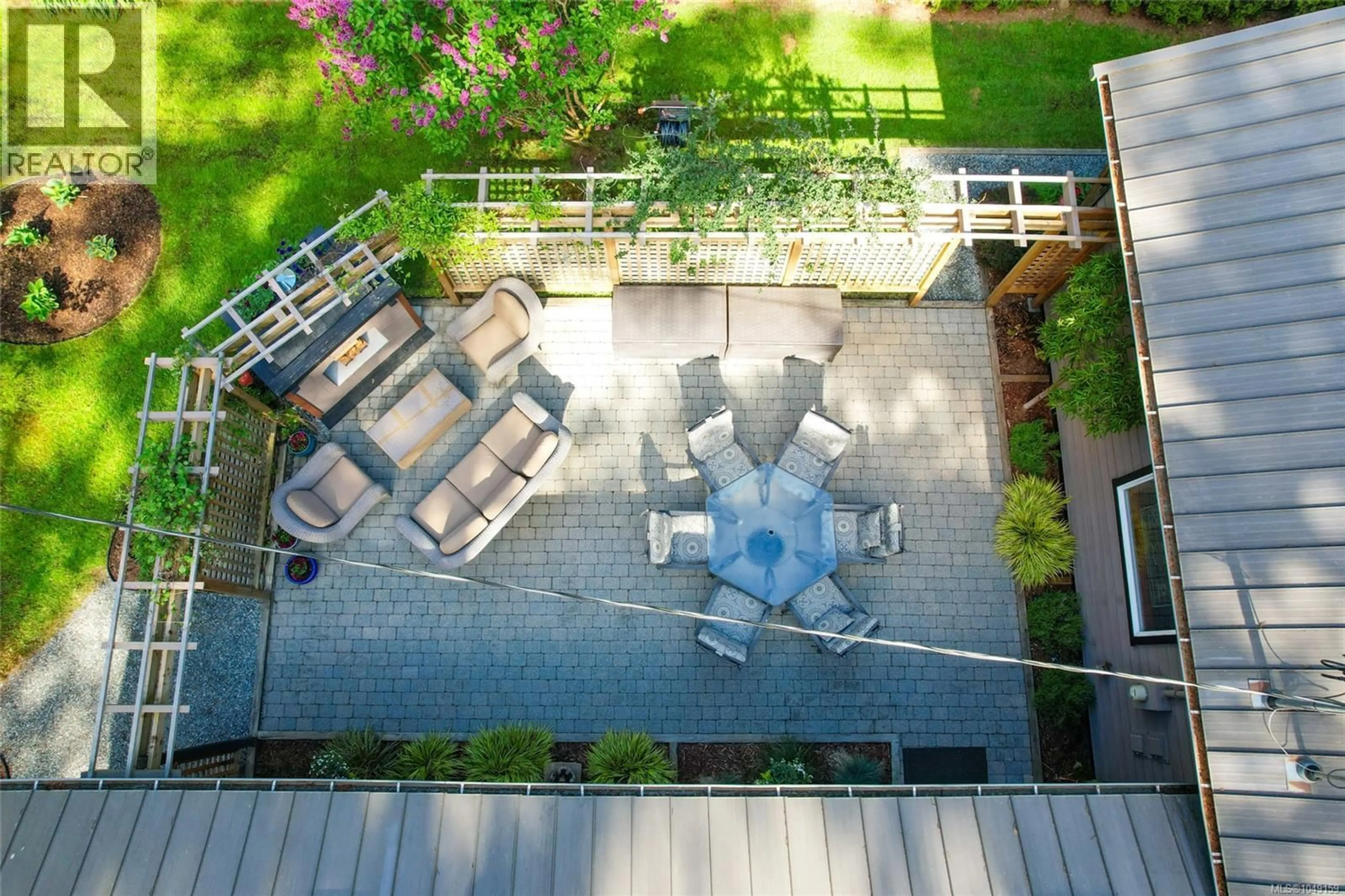 Patio, city buildings view from balcony for 1126 NORTH ROAD, Gabriola Island British Columbia V0R1X3