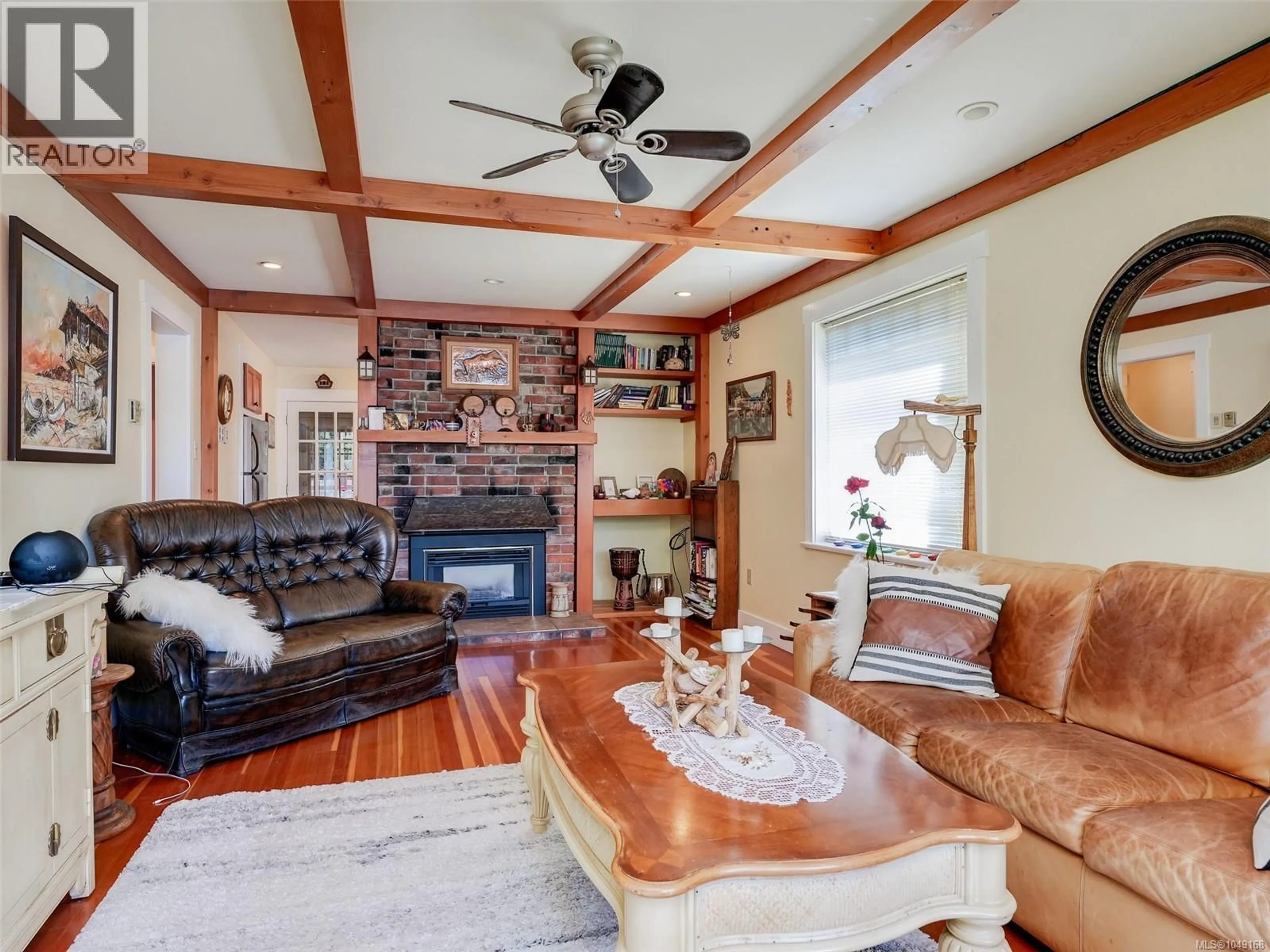 Living room with furniture, wood/laminate floor for 1167 GOLDSTREAM AVENUE, Langford British Columbia V9B2Y9