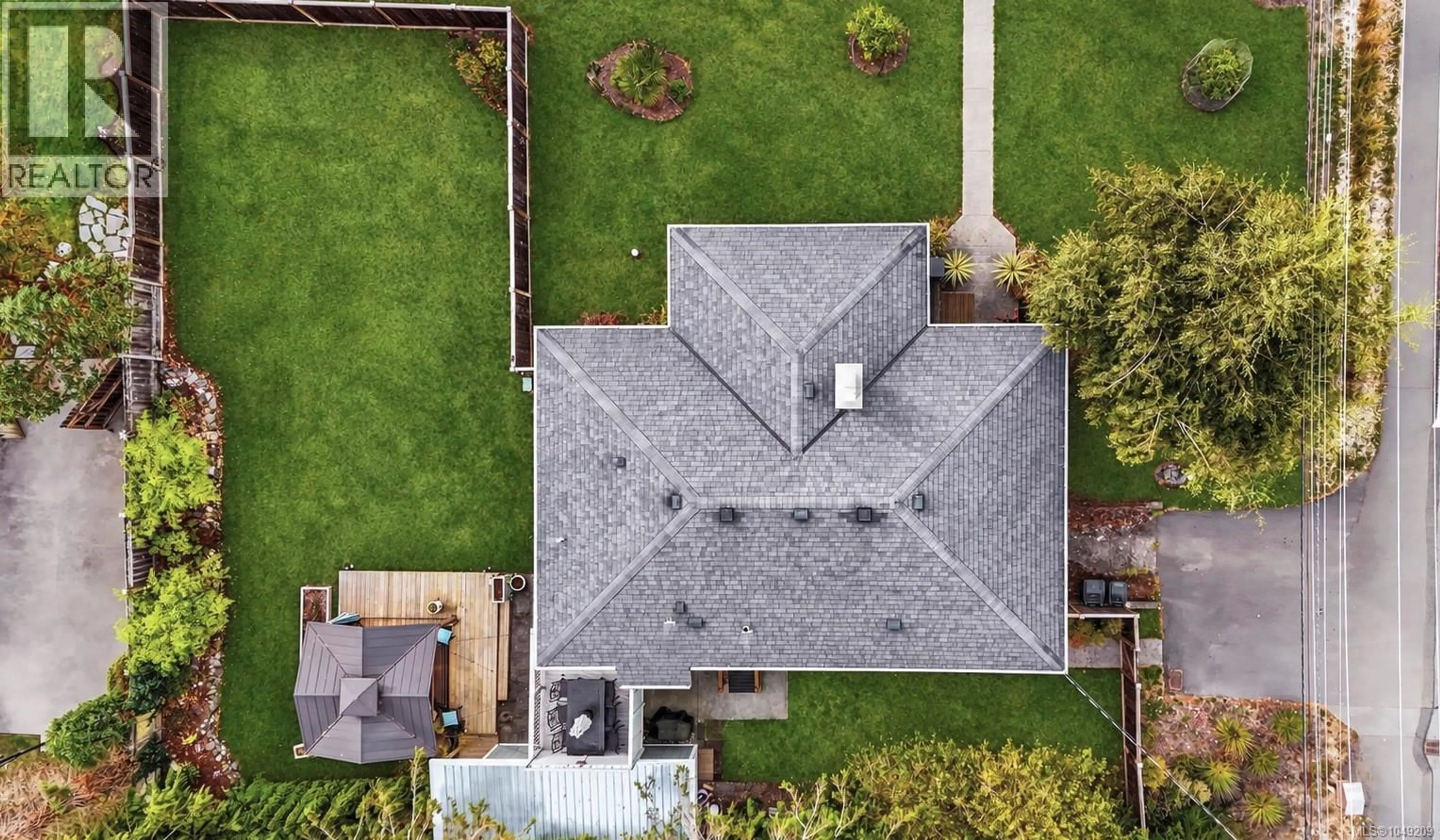 A pic from outside/outdoor area/front of a property/back of a property/a pic from drone, unknown for 3945 DAWE ROAD, Saanich British Columbia V8N4H5