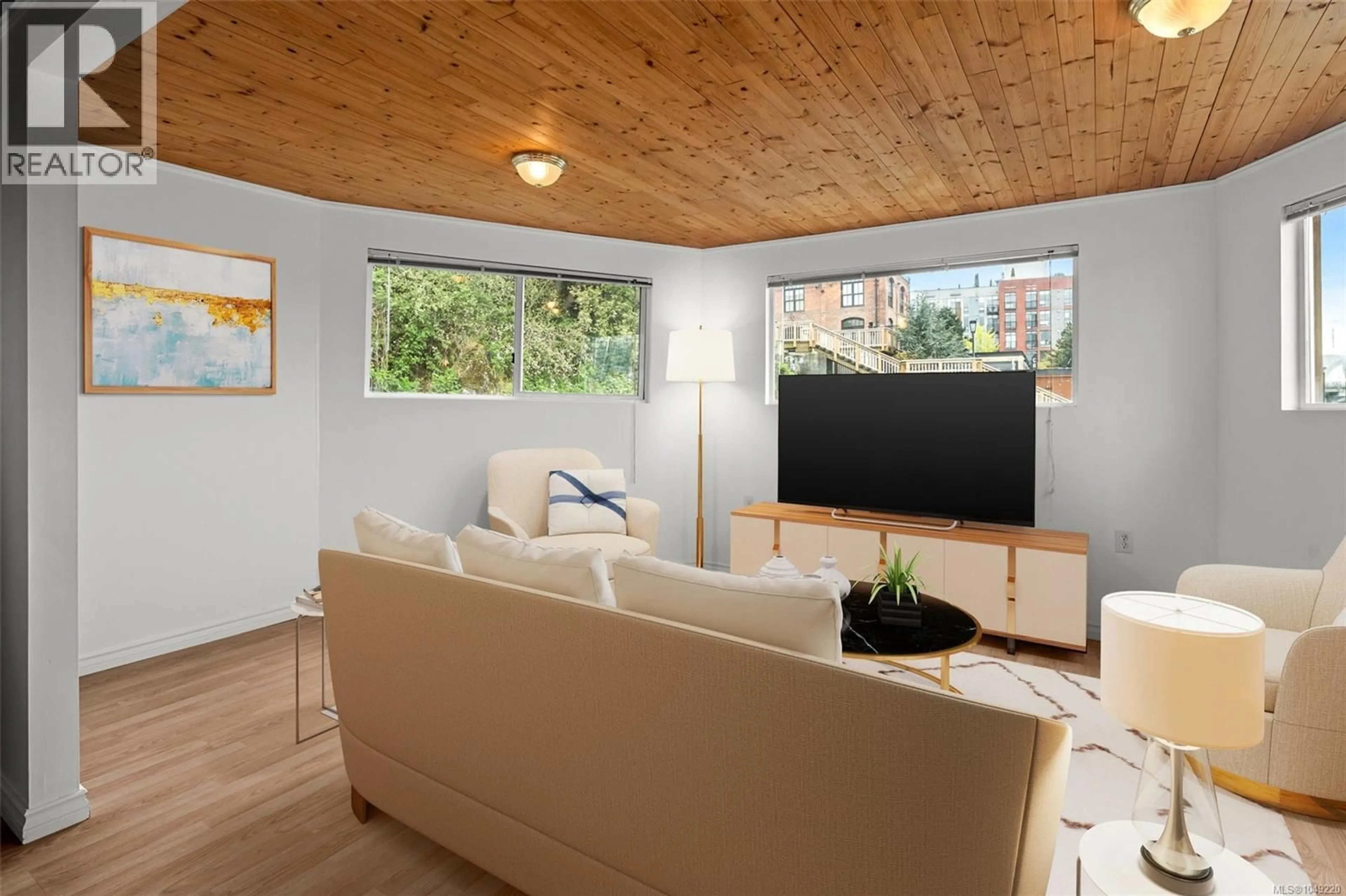 Living room with furniture, wood/laminate floor for 14 - 1810B STORE STREET, Victoria British Columbia V8T4R4