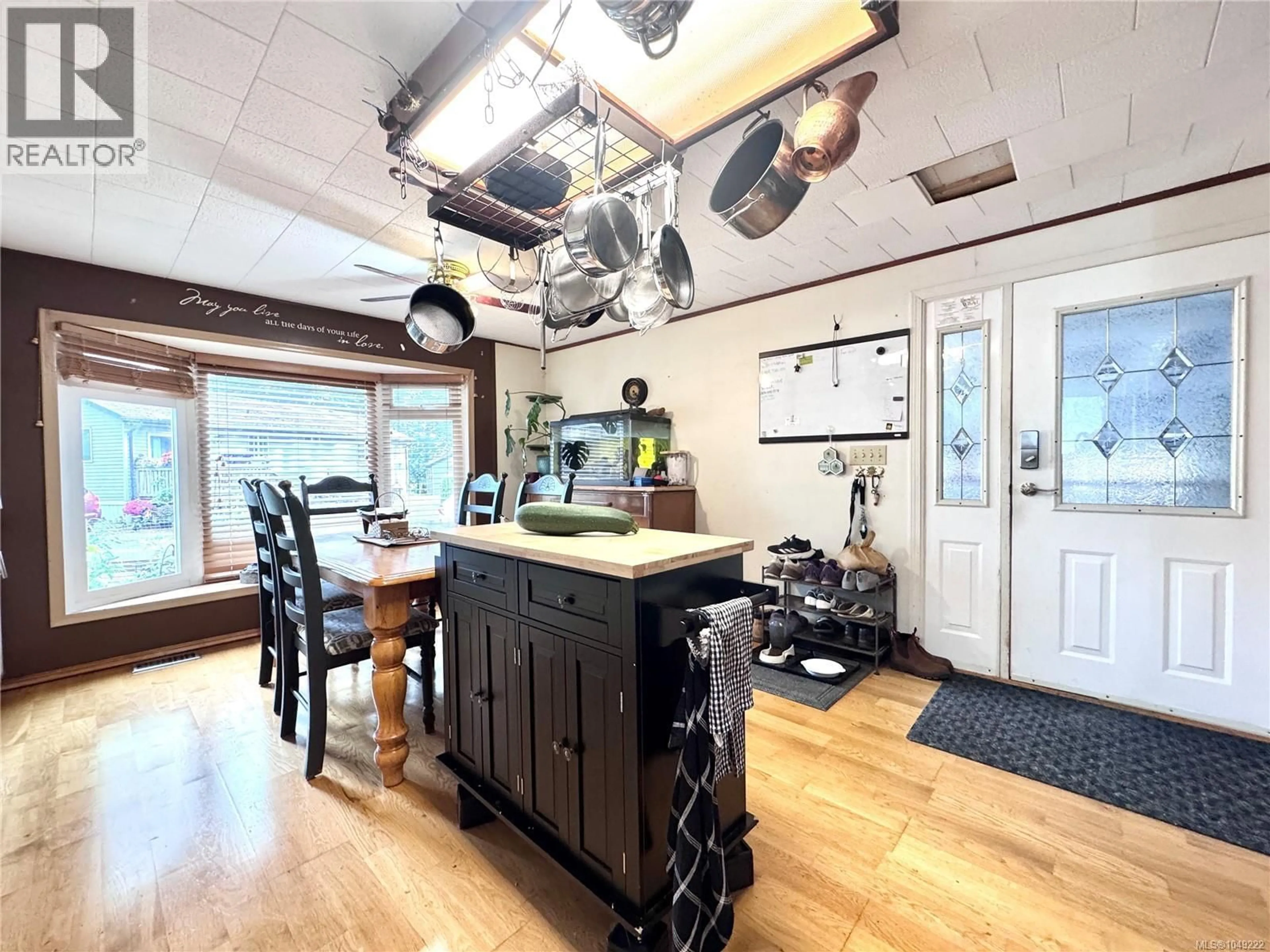 Open concept kitchen, wood/laminate floor for 11 - 6225 LUGRIN ROAD, Port Alberni British Columbia V9Y8G5