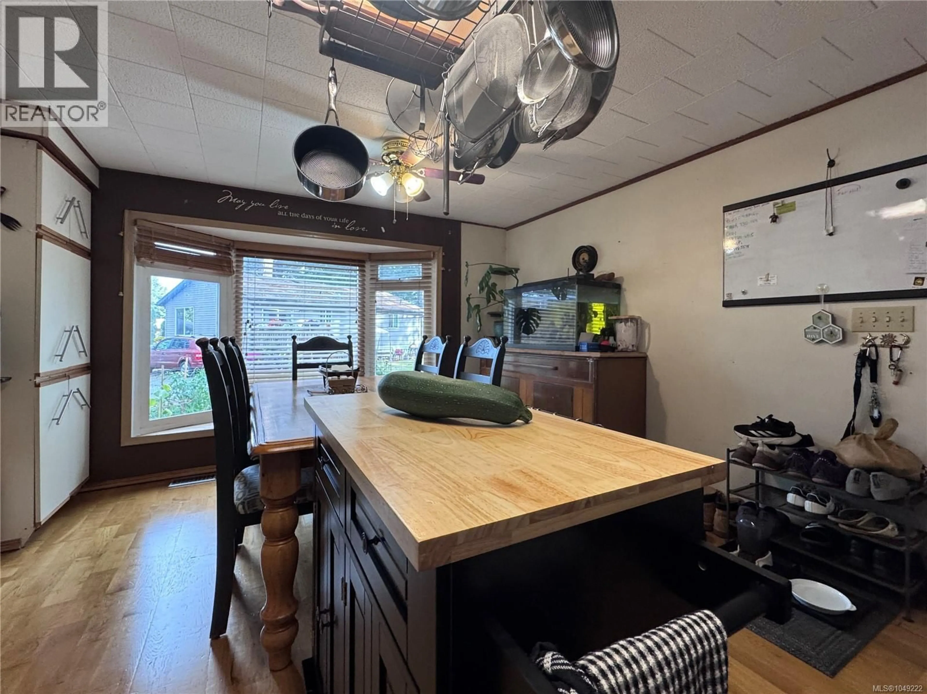 Open concept kitchen, wood/laminate floor for 11 - 6225 LUGRIN ROAD, Port Alberni British Columbia V9Y8G5