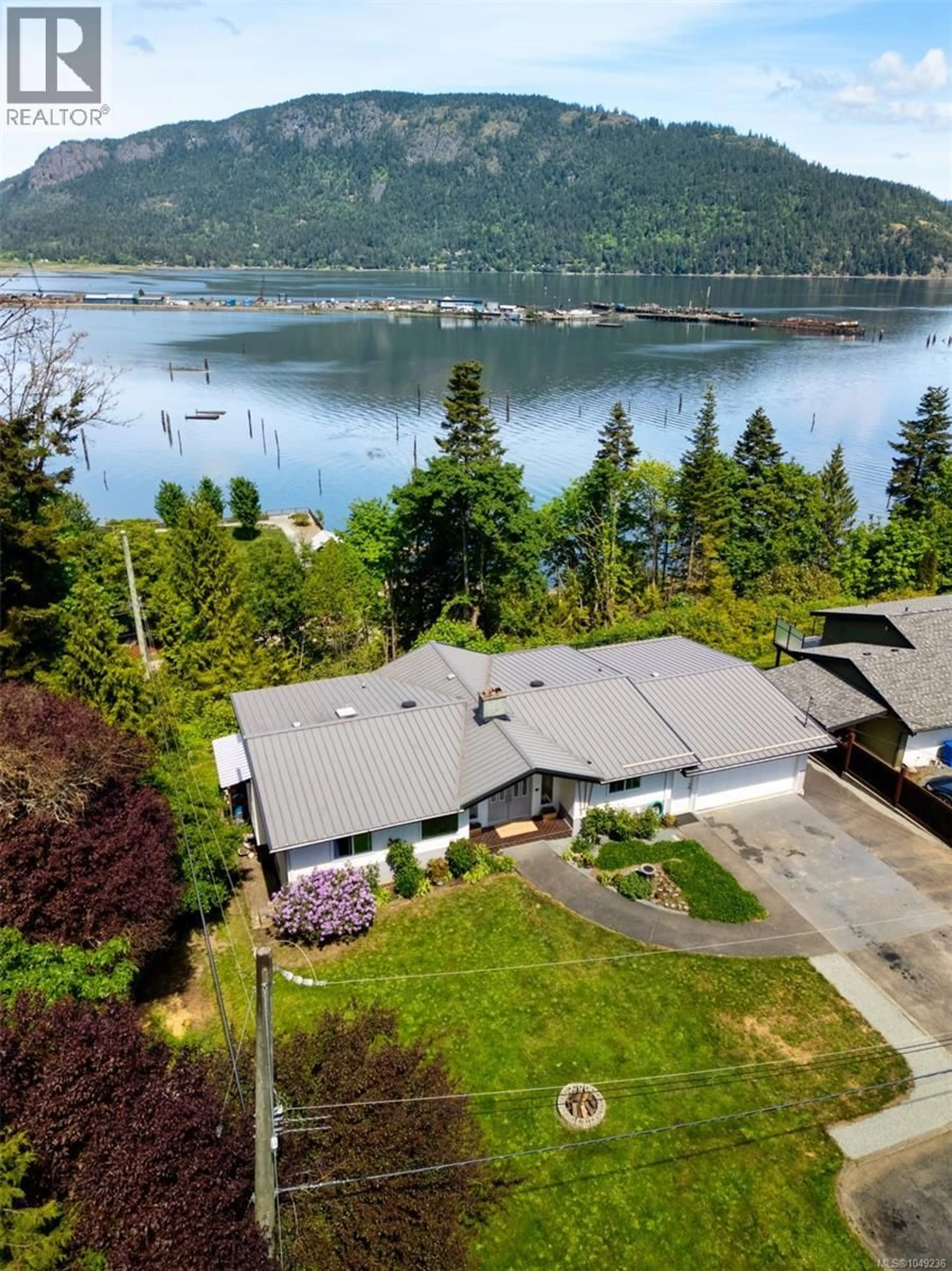 A pic from outside/outdoor area/front of a property/back of a property/a pic from drone, water/lake/river/ocean view for 1876 WESSEX ROAD, Duncan British Columbia V0R1N1