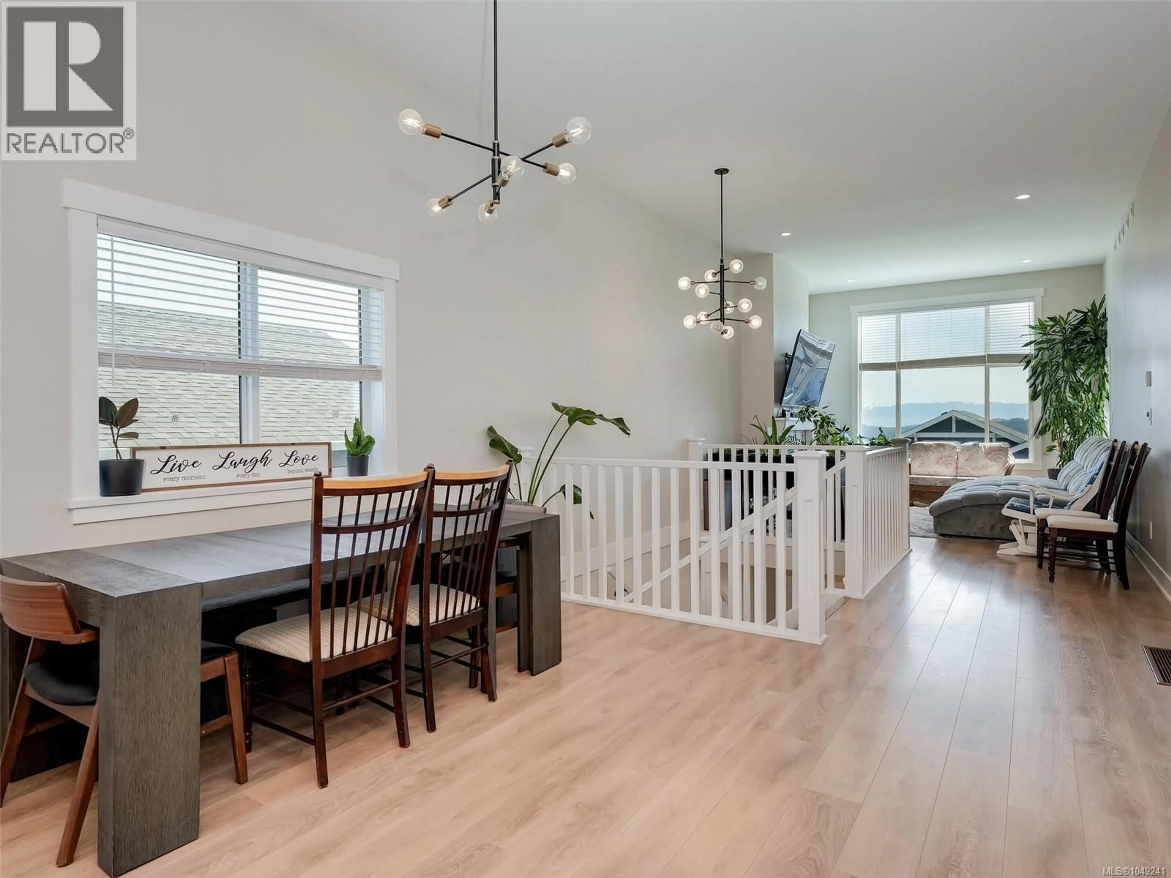 Open concept kitchen, wood/laminate floor for 2532 OBSIDIAN PLACE, Langford British Columbia V9B5L4