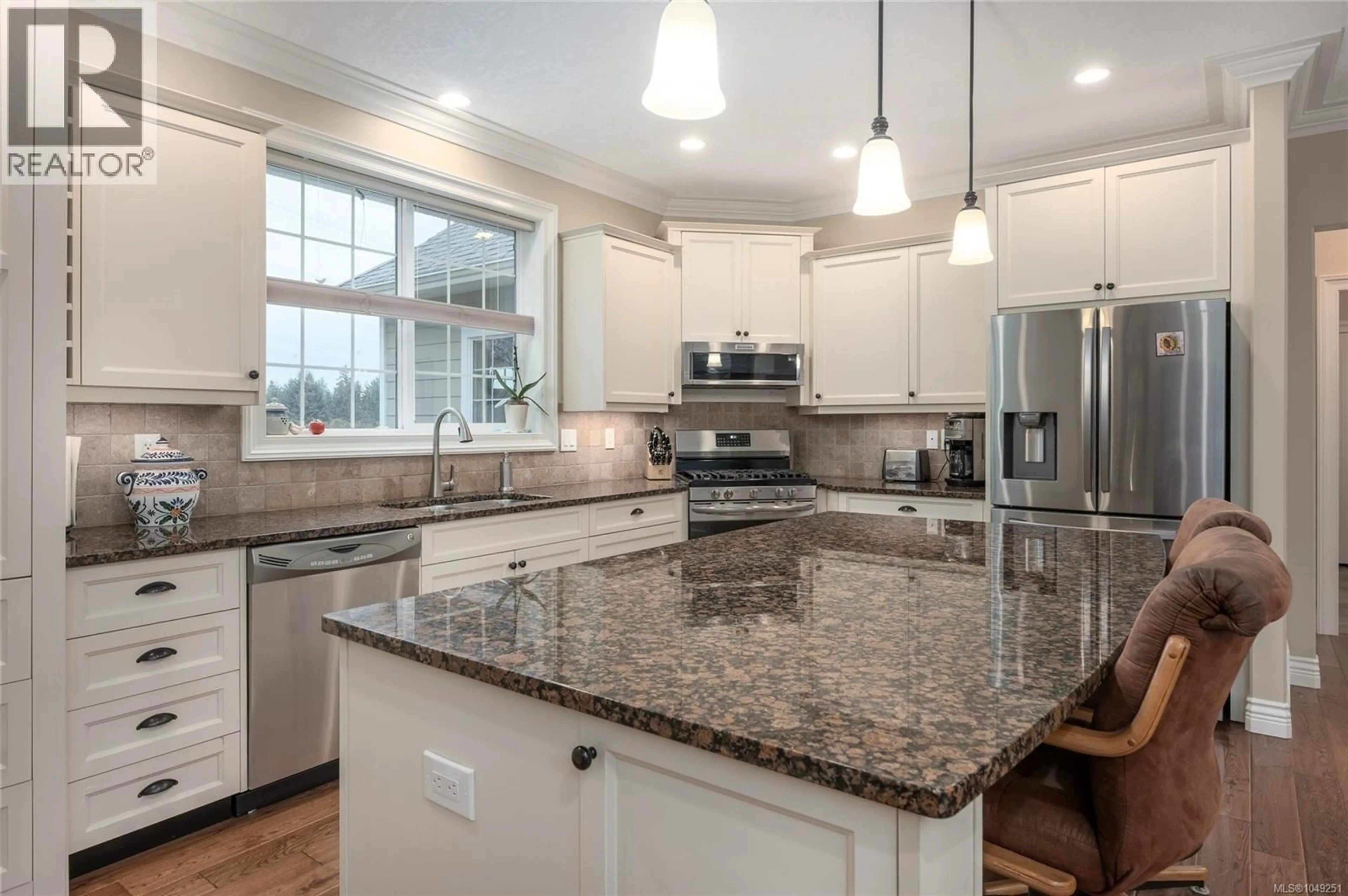 Open concept kitchen, ceramic/tile floor for 3936 CREEKSIDE DRIVE, Bowser British Columbia V0R1G0
