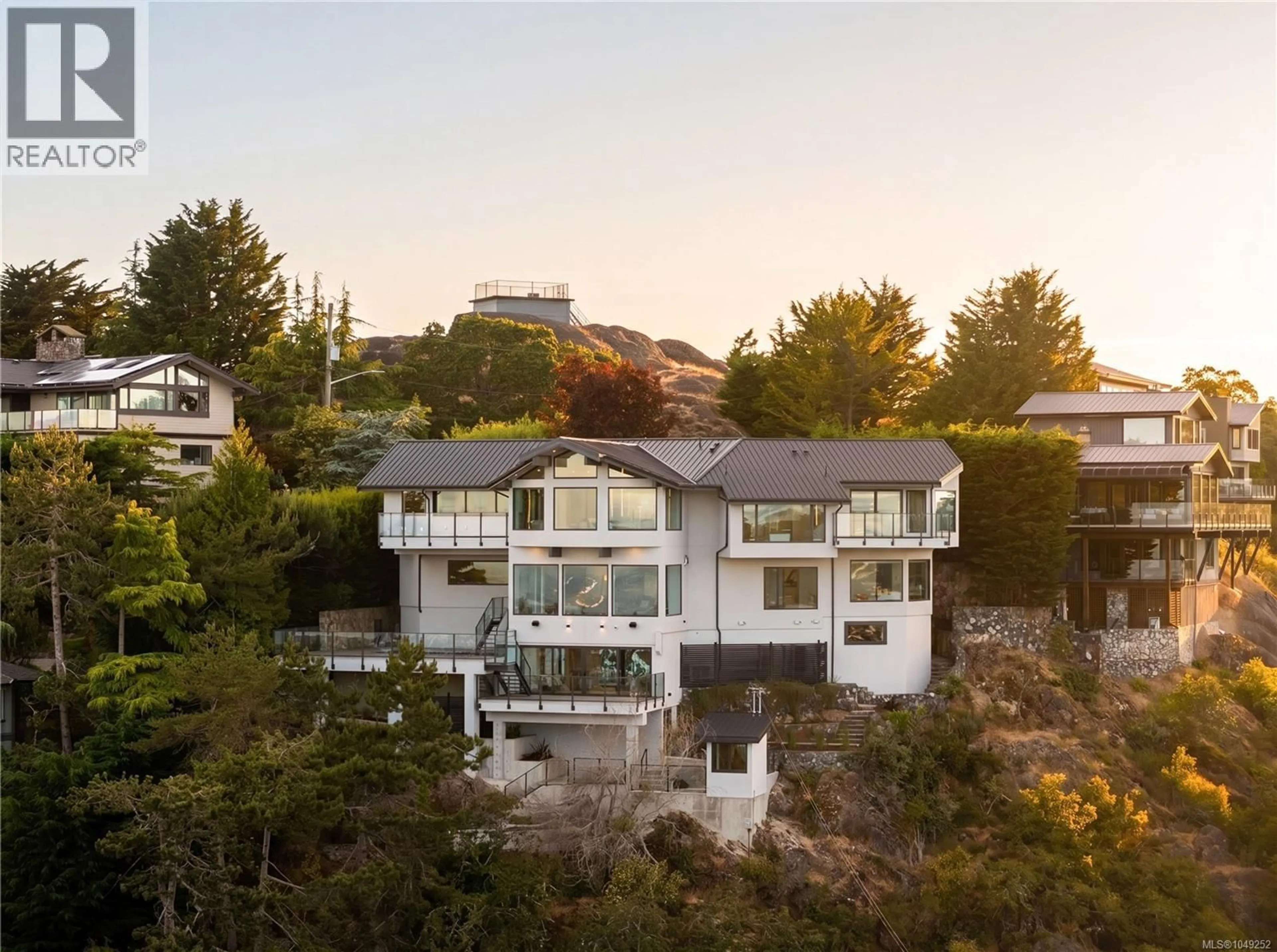 A pic from outside/outdoor area/front of a property/back of a property/a pic from drone, unknown for 121 DENISON ROAD, Oak Bay British Columbia V8S2K2