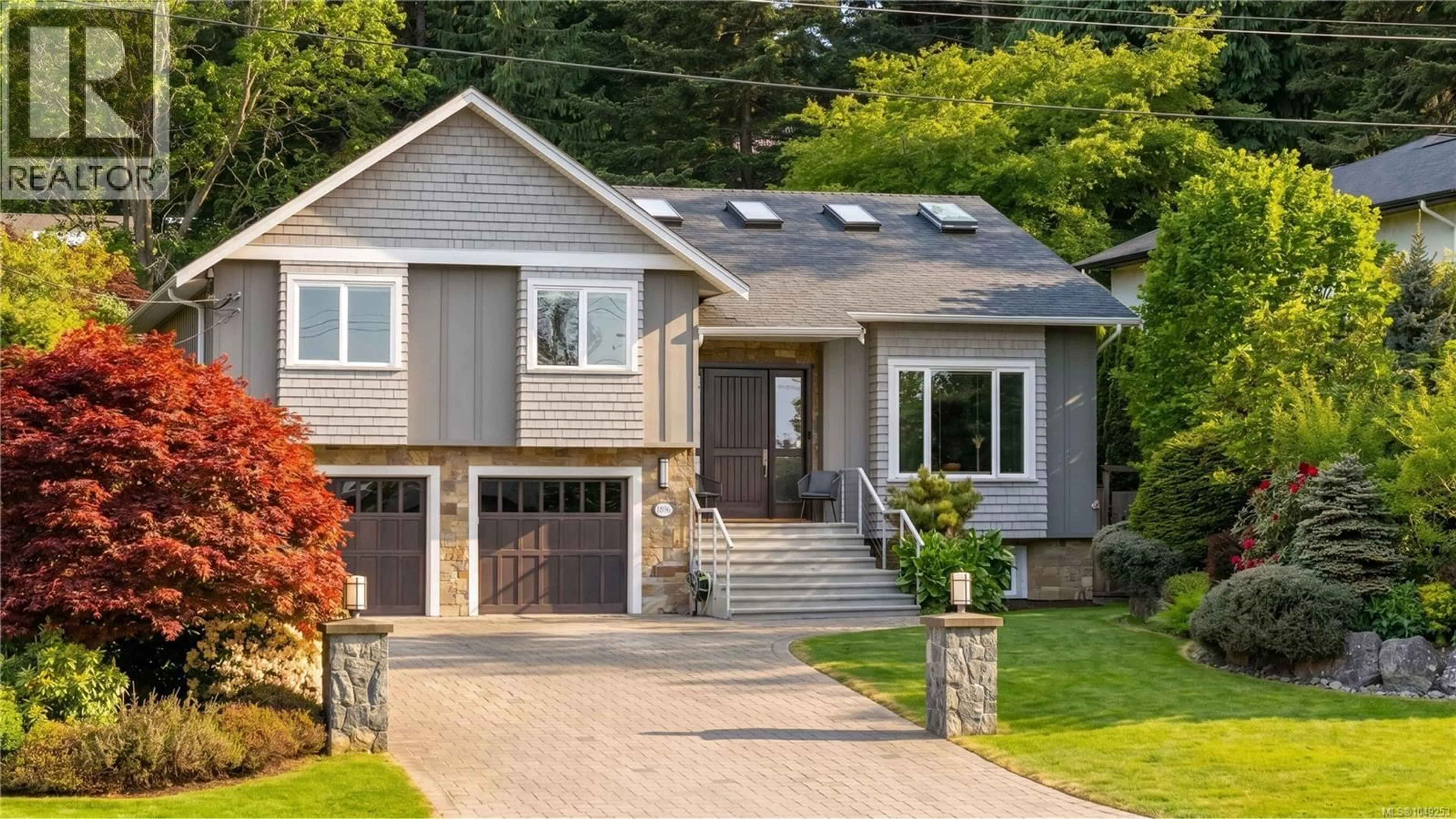 Home with vinyl exterior material, street for 1896 LEYNS ROAD, Saanich British Columbia V8N2Z8
