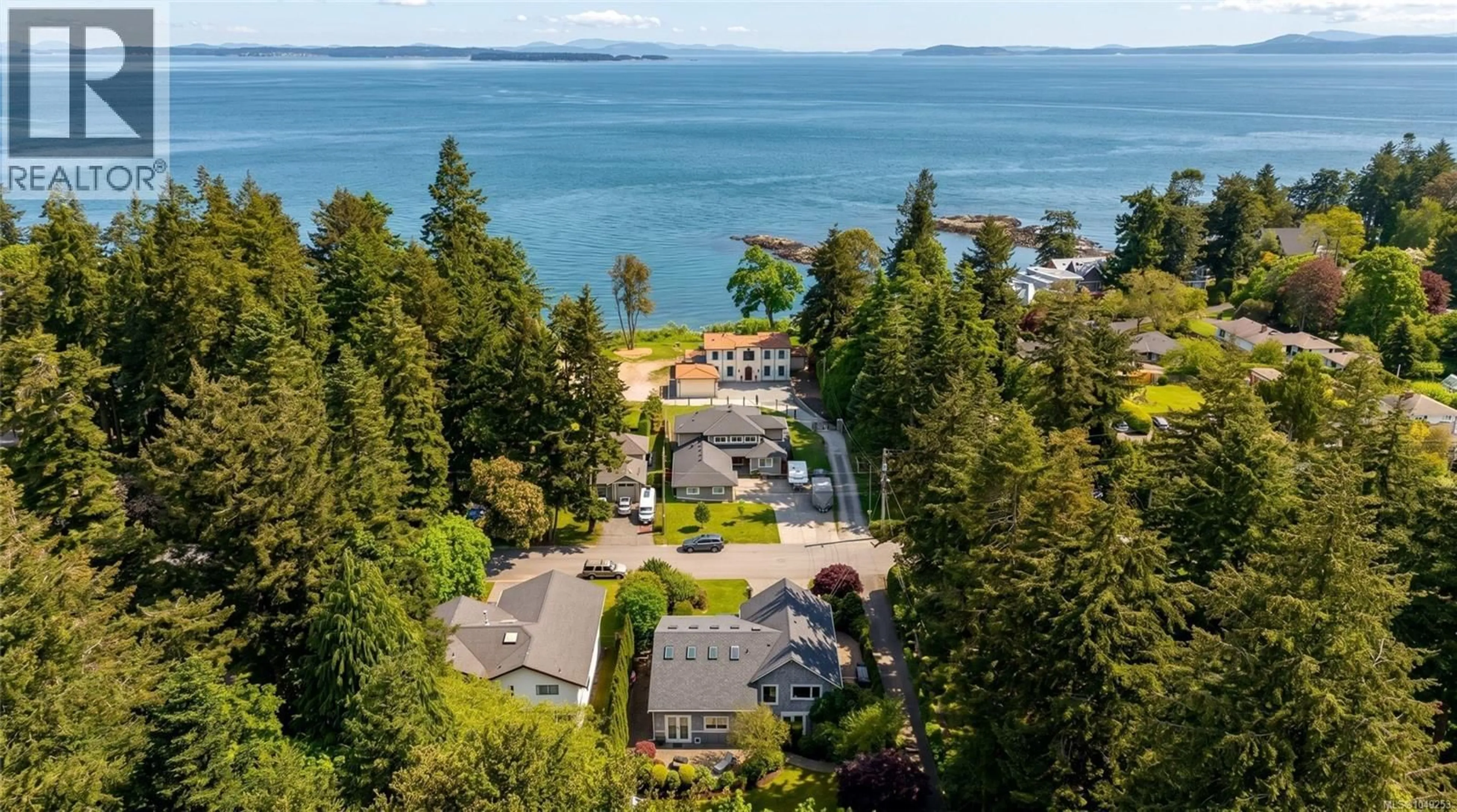 A pic from outside/outdoor area/front of a property/back of a property/a pic from drone, water/lake/river/ocean view for 1896 LEYNS ROAD, Saanich British Columbia V8N2Z8