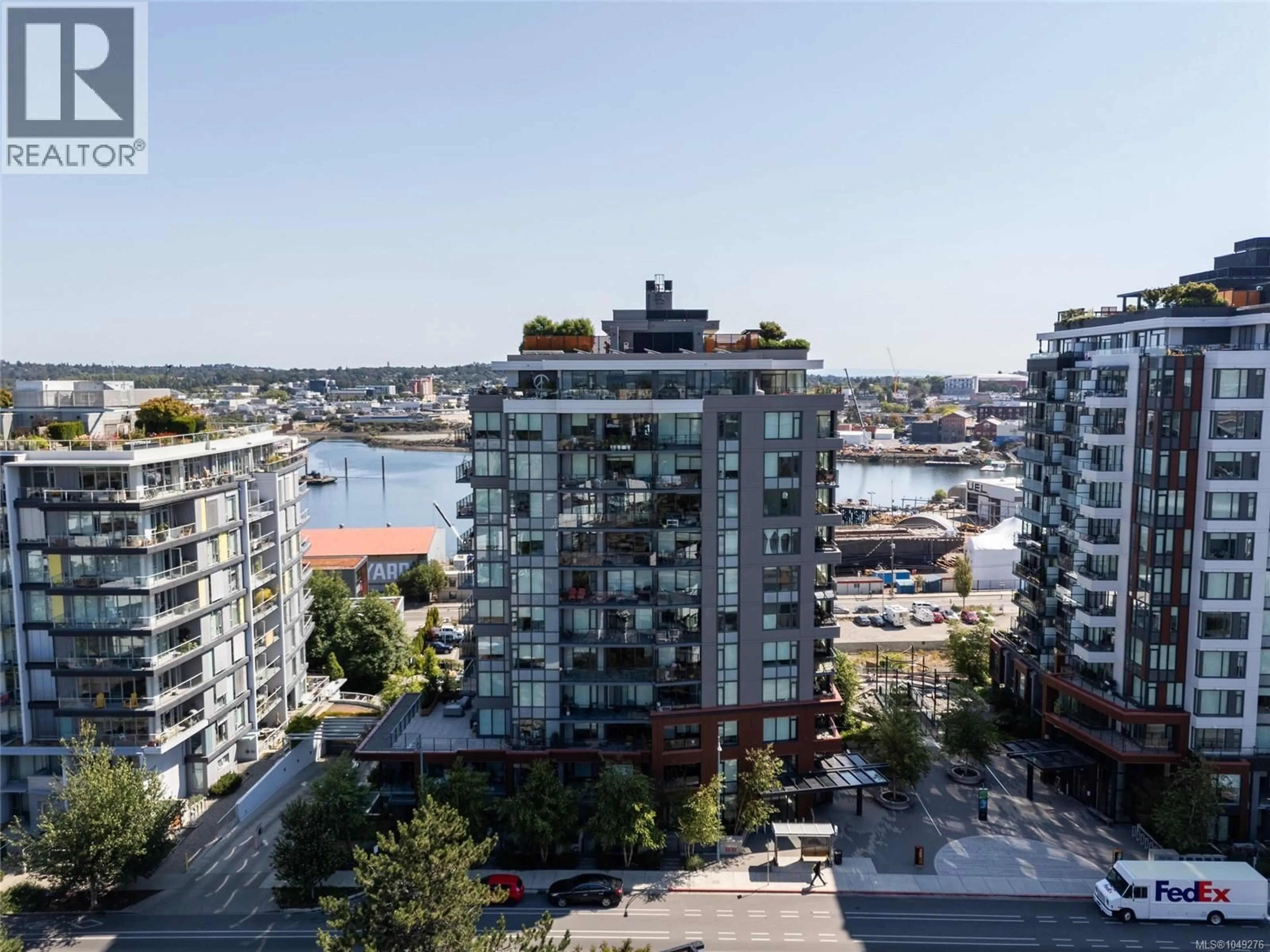 A pic from outside/outdoor area/front of a property/back of a property/a pic from drone, city buildings view from balcony for 705 - 369 TYEE ROAD, Victoria British Columbia V9A0B6