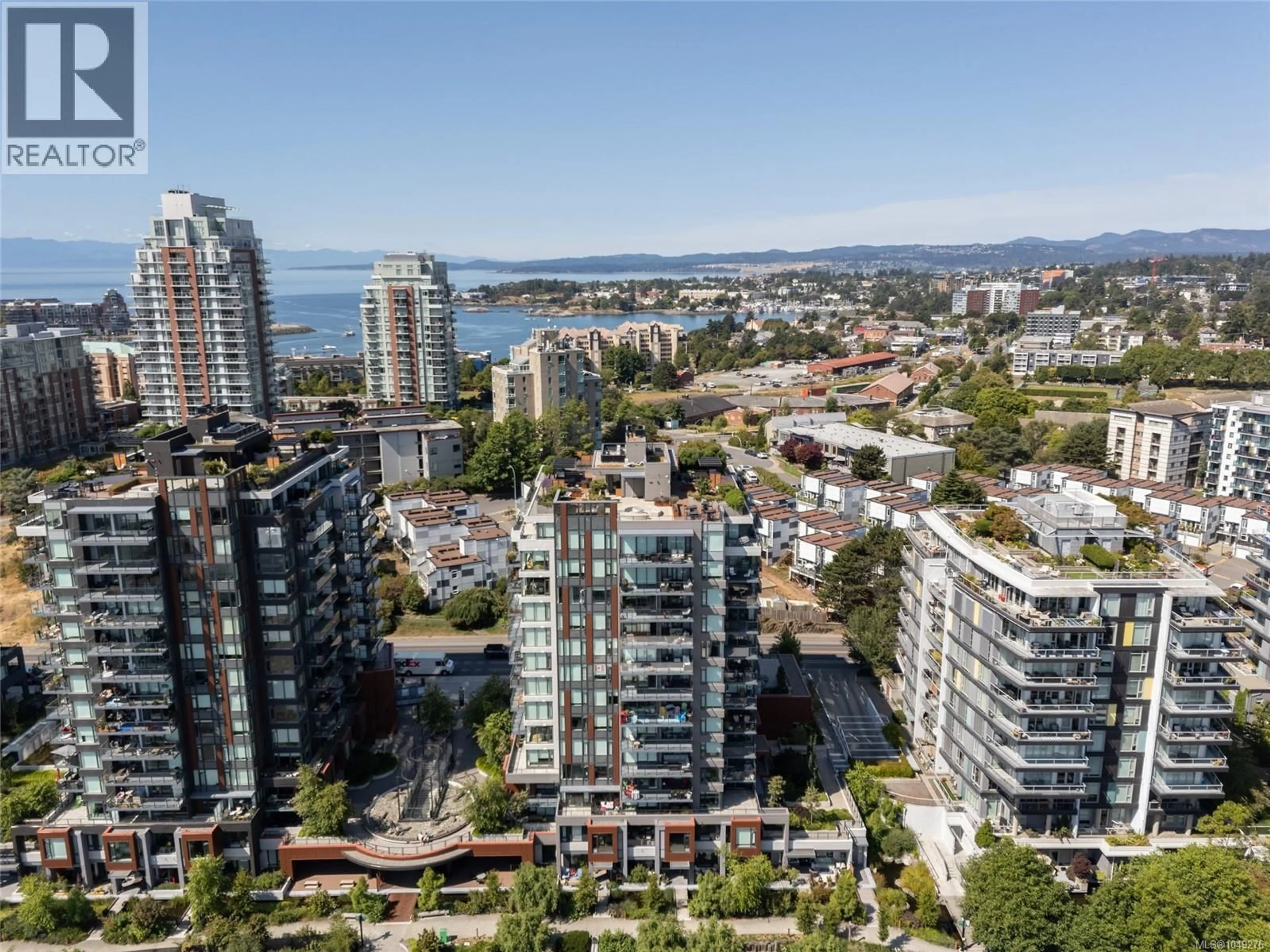 A pic from outside/outdoor area/front of a property/back of a property/a pic from drone, city buildings view from balcony for 705 - 369 TYEE ROAD, Victoria British Columbia V9A0B6