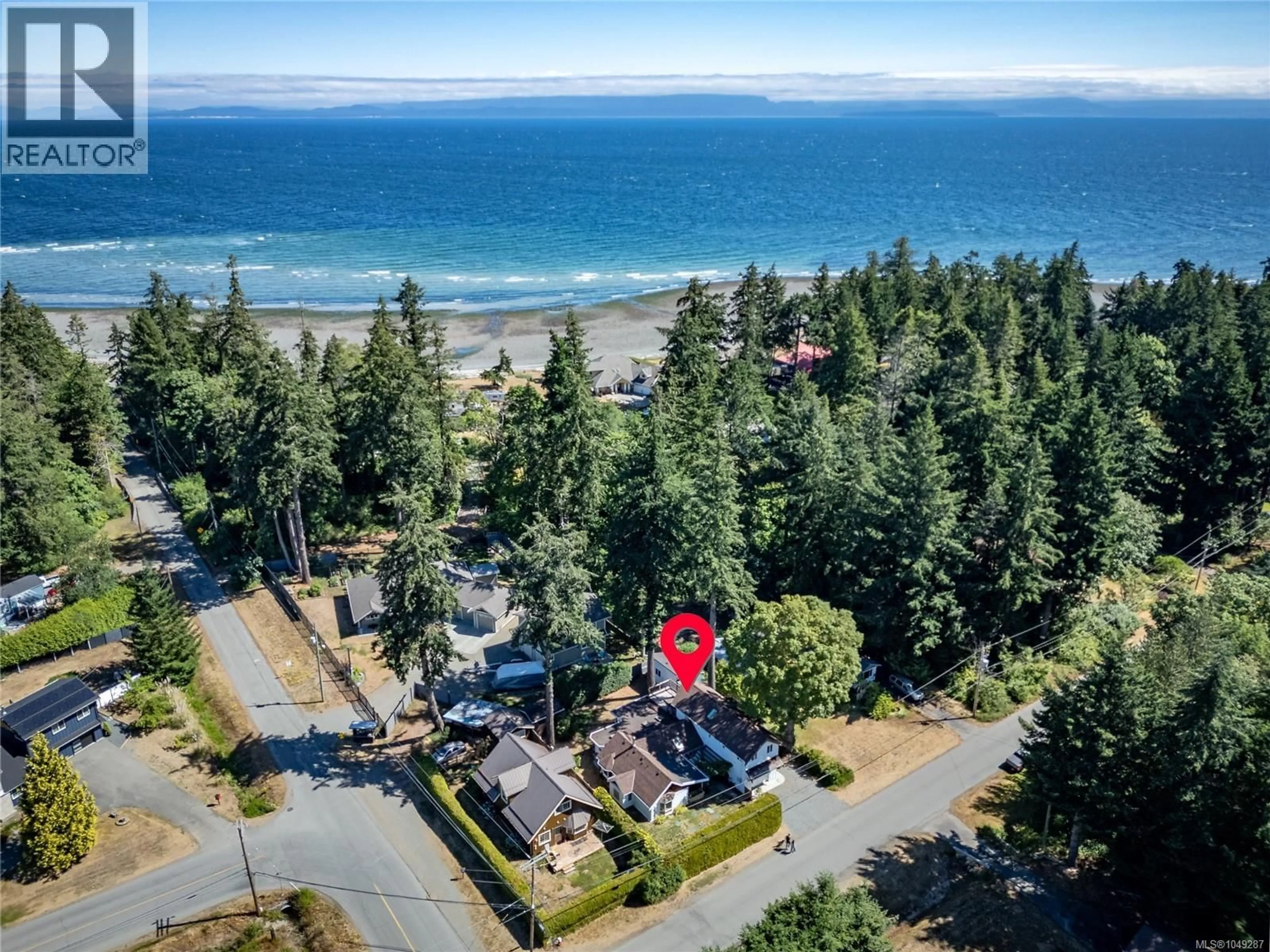 A pic from outside/outdoor area/front of a property/back of a property/a pic from drone, water/lake/river/ocean view for 1162 BOOTH ROAD SOUTHWEST, Comox British Columbia V9M4B4