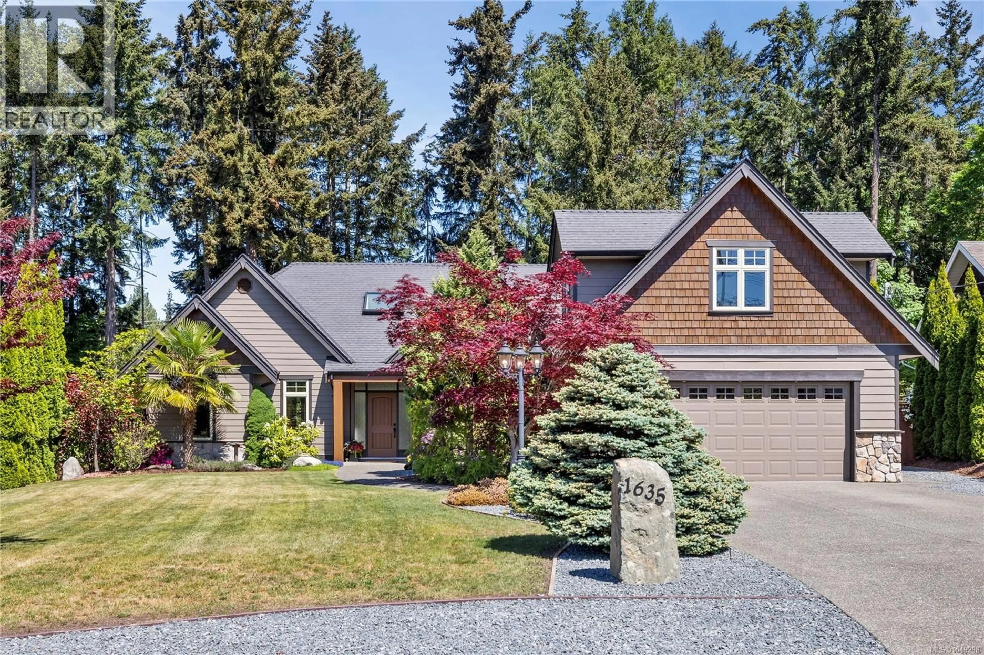 Home with vinyl exterior material, street for 1635 STONE LAKE DRIVE, Nanoose Bay British Columbia V9P9L1
