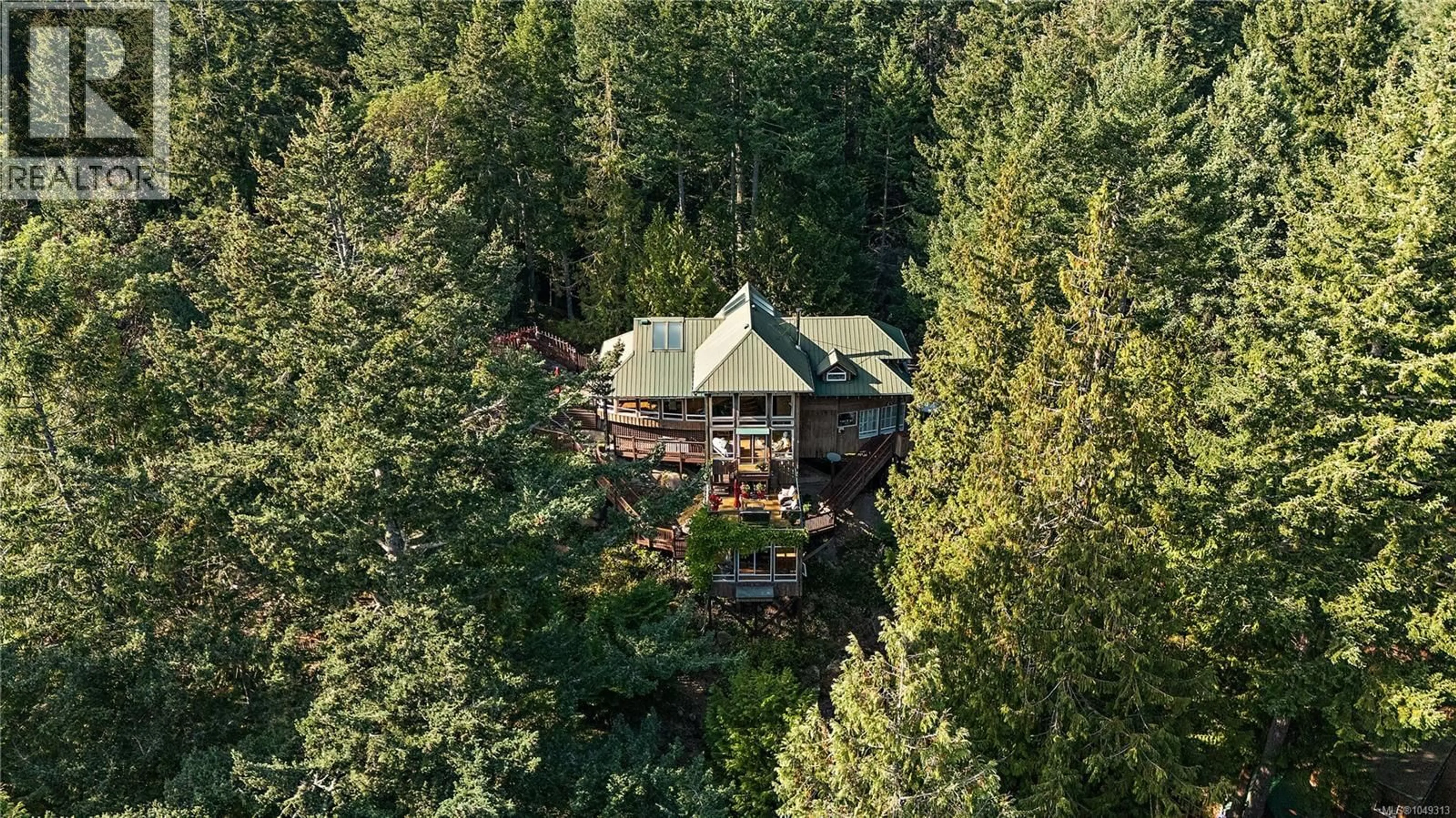 A pic from outside/outdoor area/front of a property/back of a property/a pic from drone, forest/trees view for 486 BLUFF WAY, Mayne Island British Columbia V0N2J2