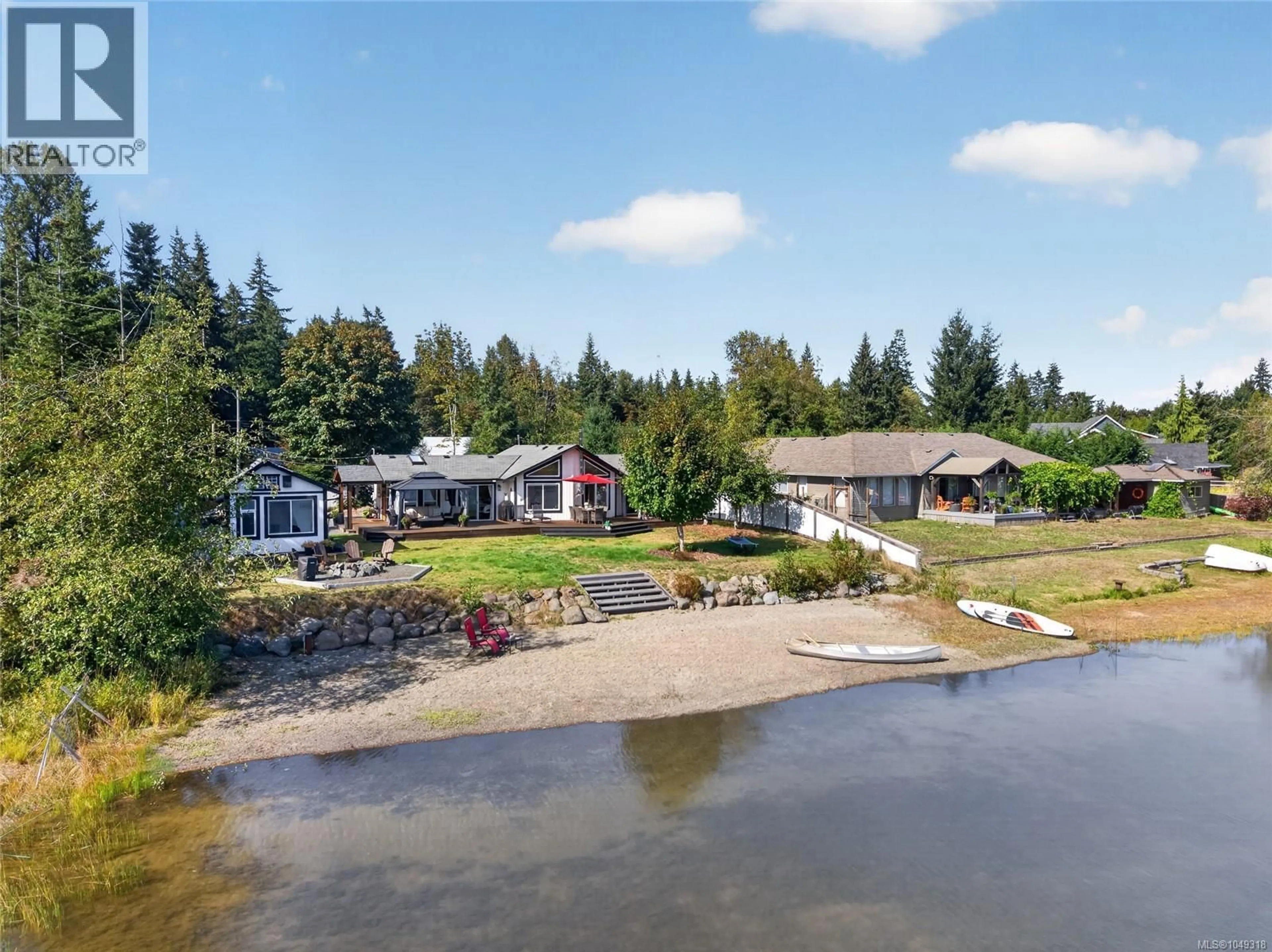 A pic from outside/outdoor area/front of a property/back of a property/a pic from drone, water/lake/river/ocean view for 9484 MARTIN PARK DRIVE, Black Creek British Columbia V9J1C4