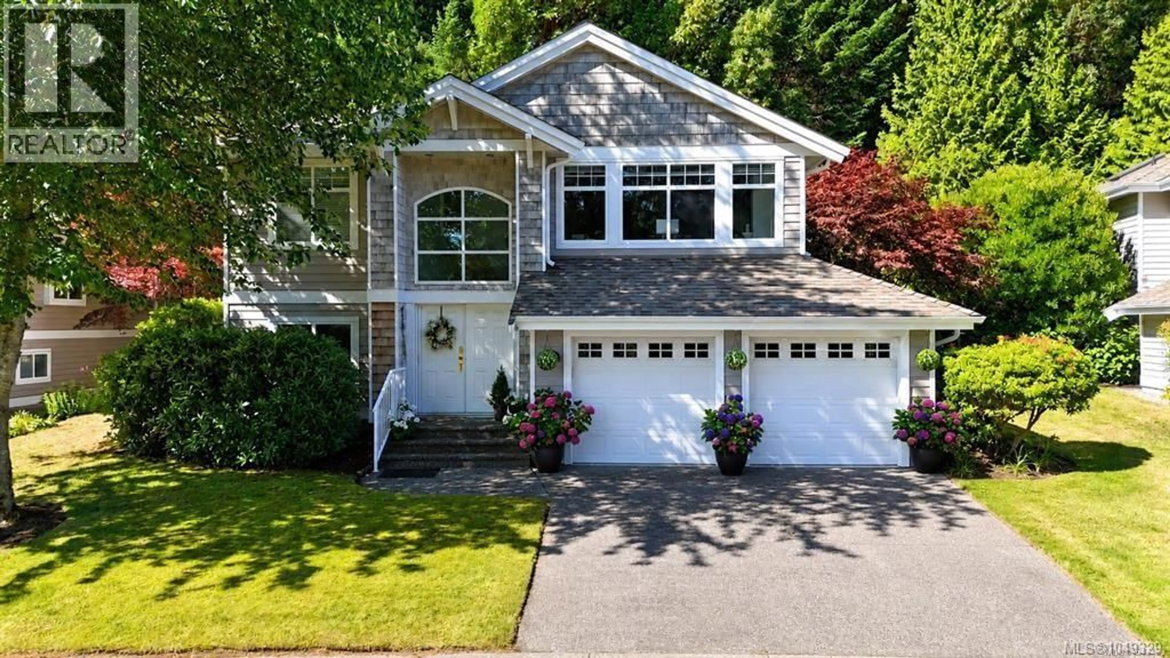Home with vinyl exterior material, street for 1266 SATURNA DRIVE, Parksville British Columbia V9P2X6
