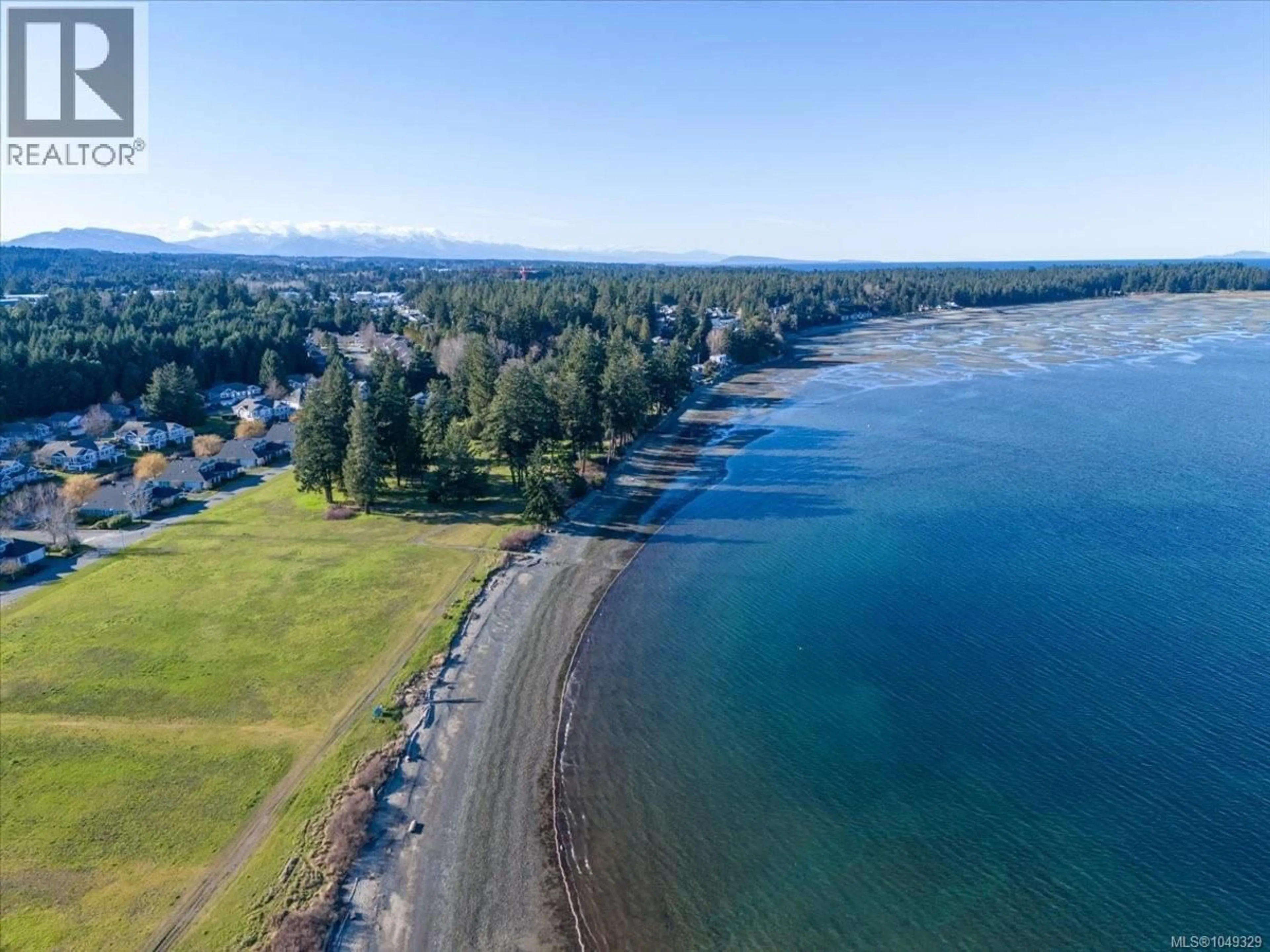 A pic from outside/outdoor area/front of a property/back of a property/a pic from drone, water/lake/river/ocean view for 1266 SATURNA DRIVE, Parksville British Columbia V9P2X6