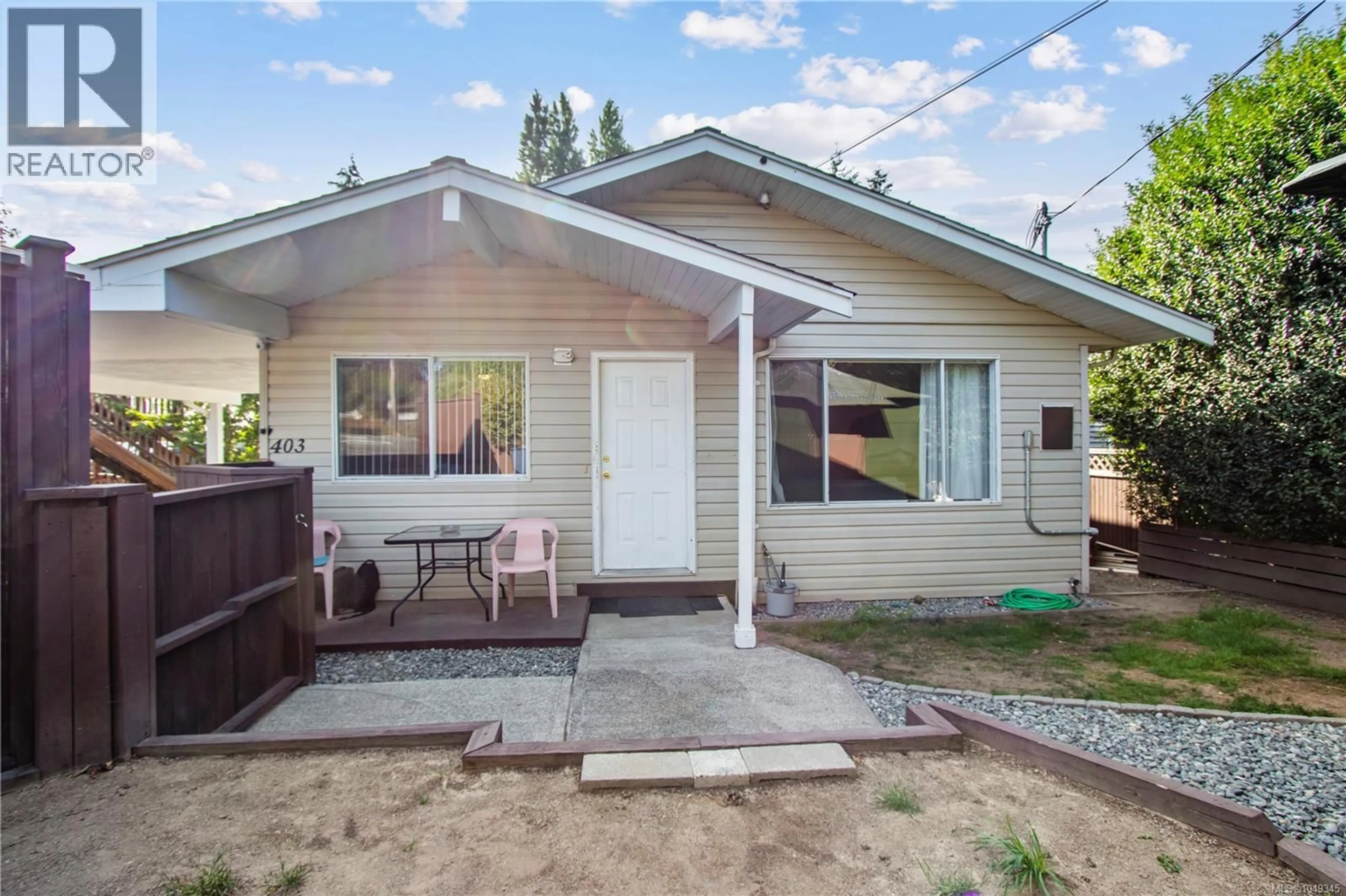 Home with vinyl exterior material, street for 403 HAREWOOD ROAD, Nanaimo British Columbia V9R2Z3