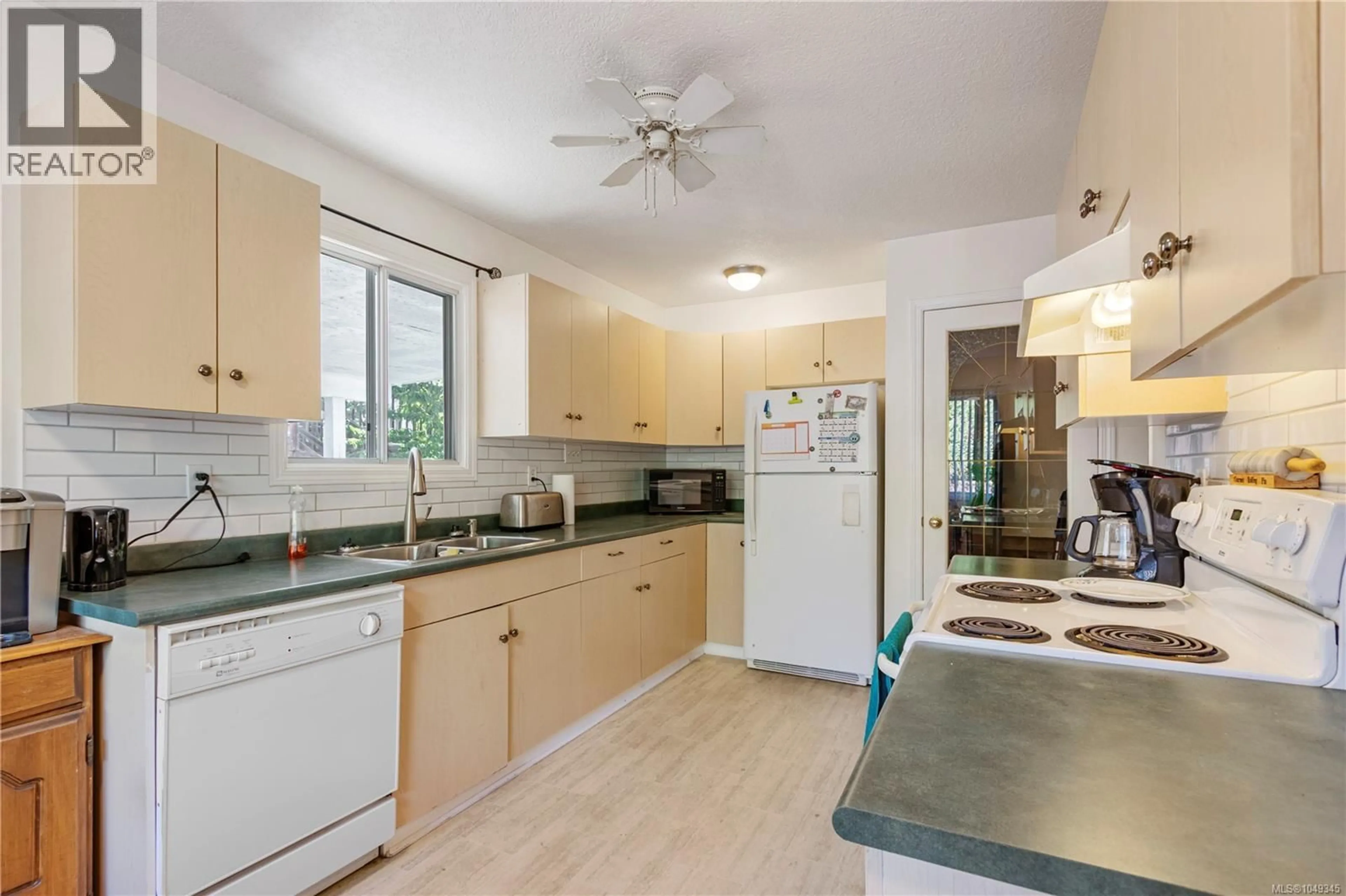 Standard kitchen, ceramic/tile floor for 403 HAREWOOD ROAD, Nanaimo British Columbia V9R2Z3