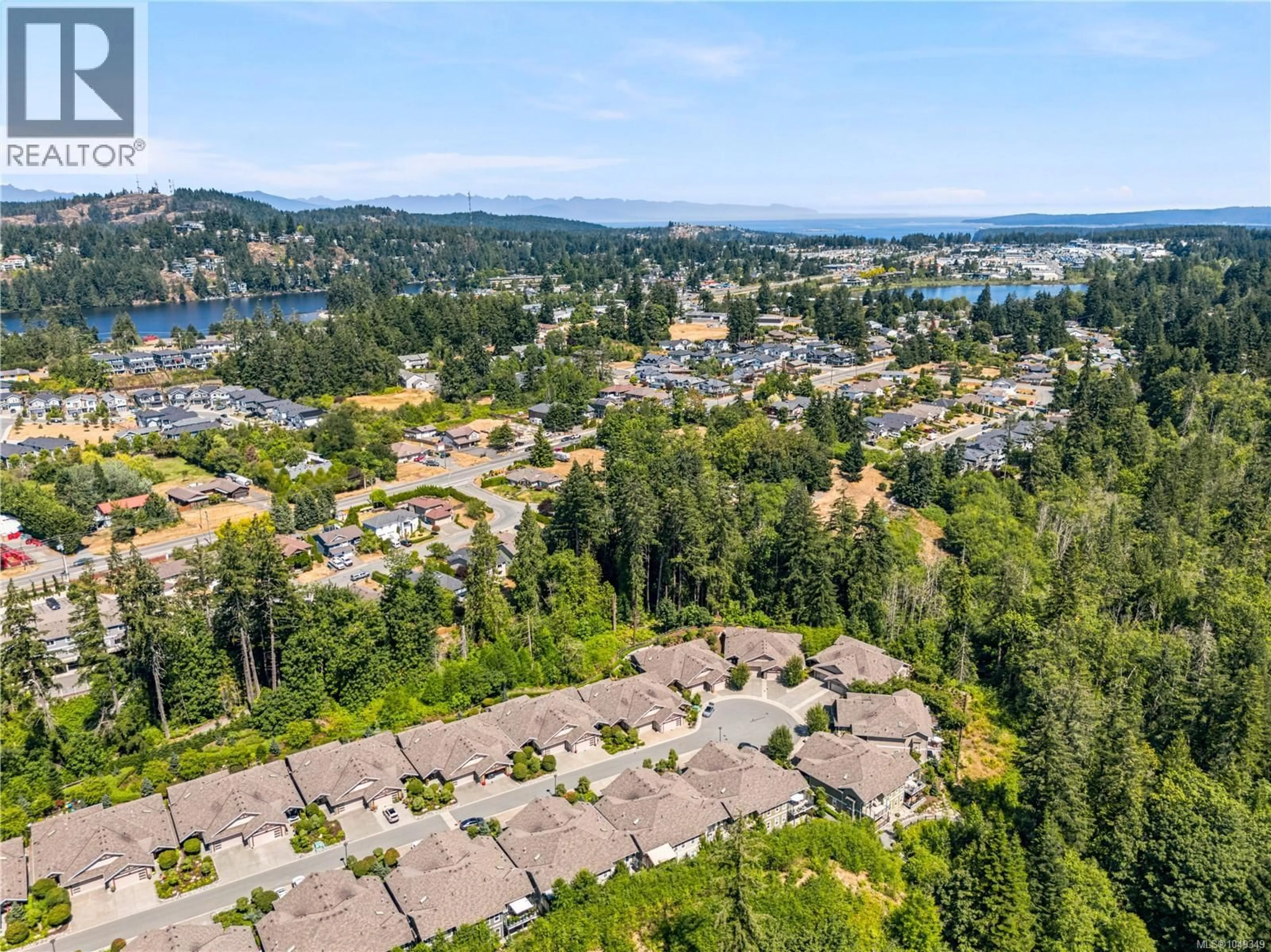 A pic from outside/outdoor area/front of a property/back of a property/a pic from drone, water/lake/river/ocean view for 4153 EMERALD WOODS PLACE, Nanaimo British Columbia V9T0K6