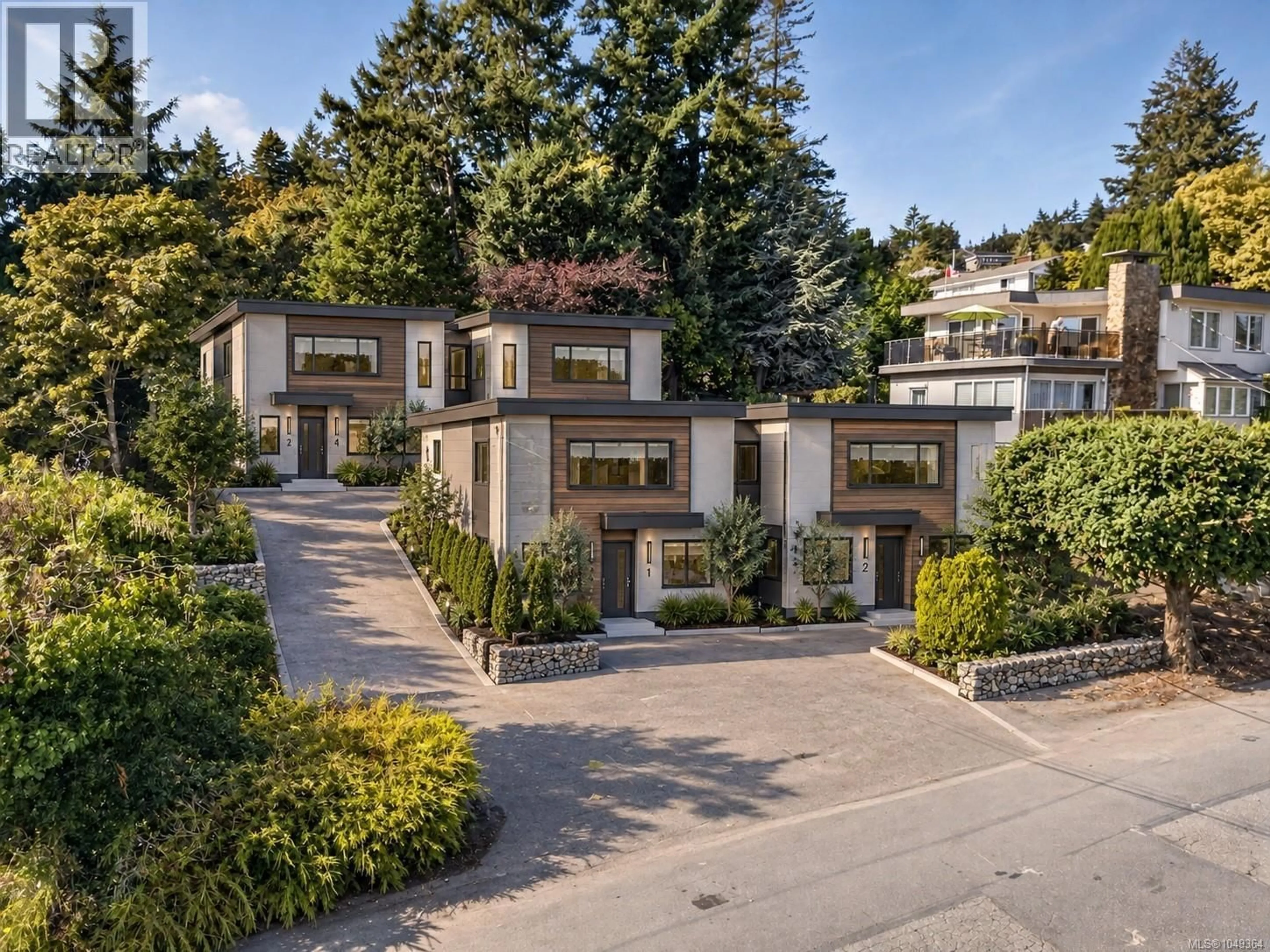 A pic from outside/outdoor area/front of a property/back of a property/a pic from drone, street for 131 MILBURN DRIVE, Colwood British Columbia V9C1T7