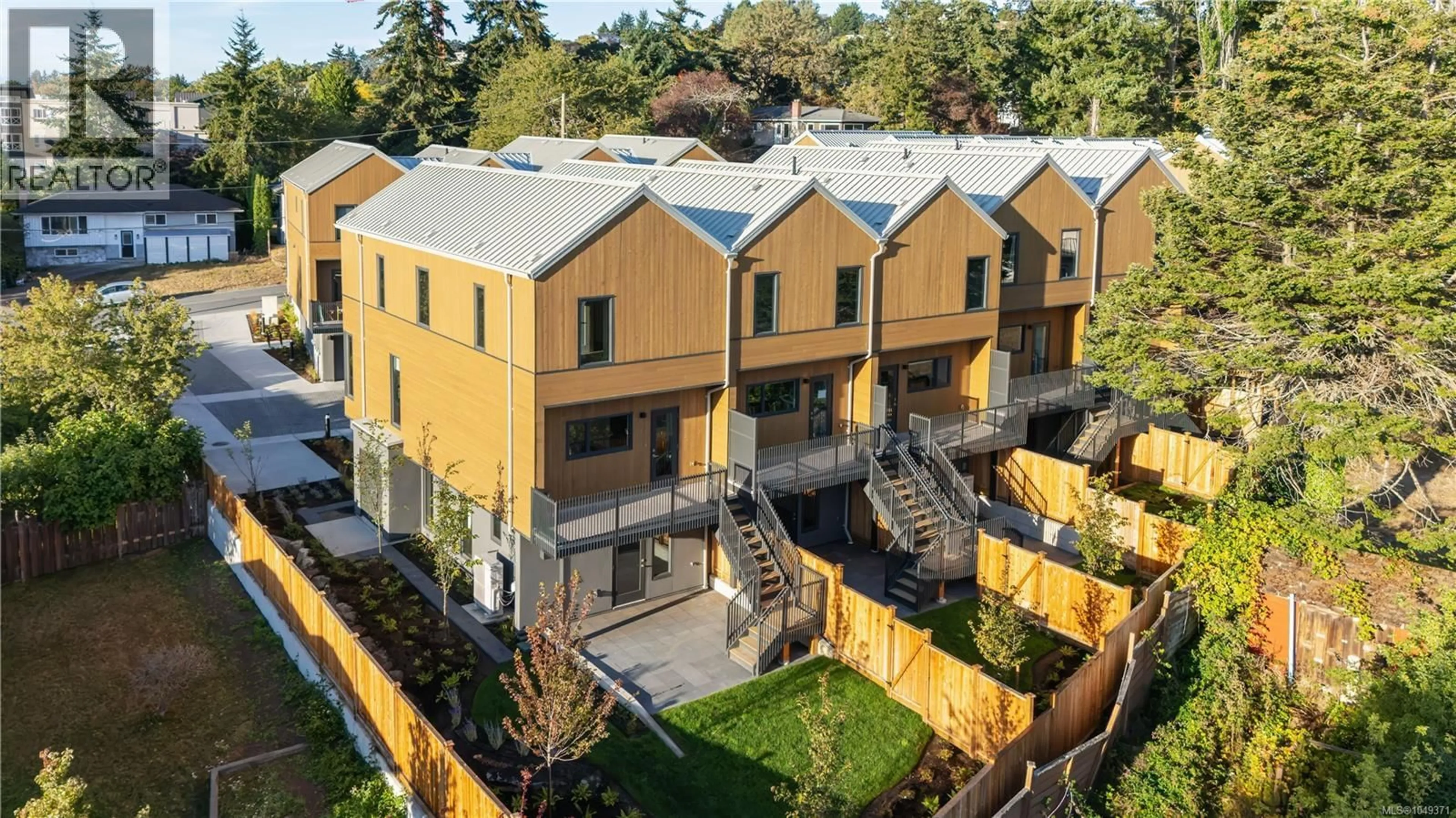 A pic from outside/outdoor area/front of a property/back of a property/a pic from drone, street for 13 - 1520 LOUISE PLACE, Saanich British Columbia V8P2T8