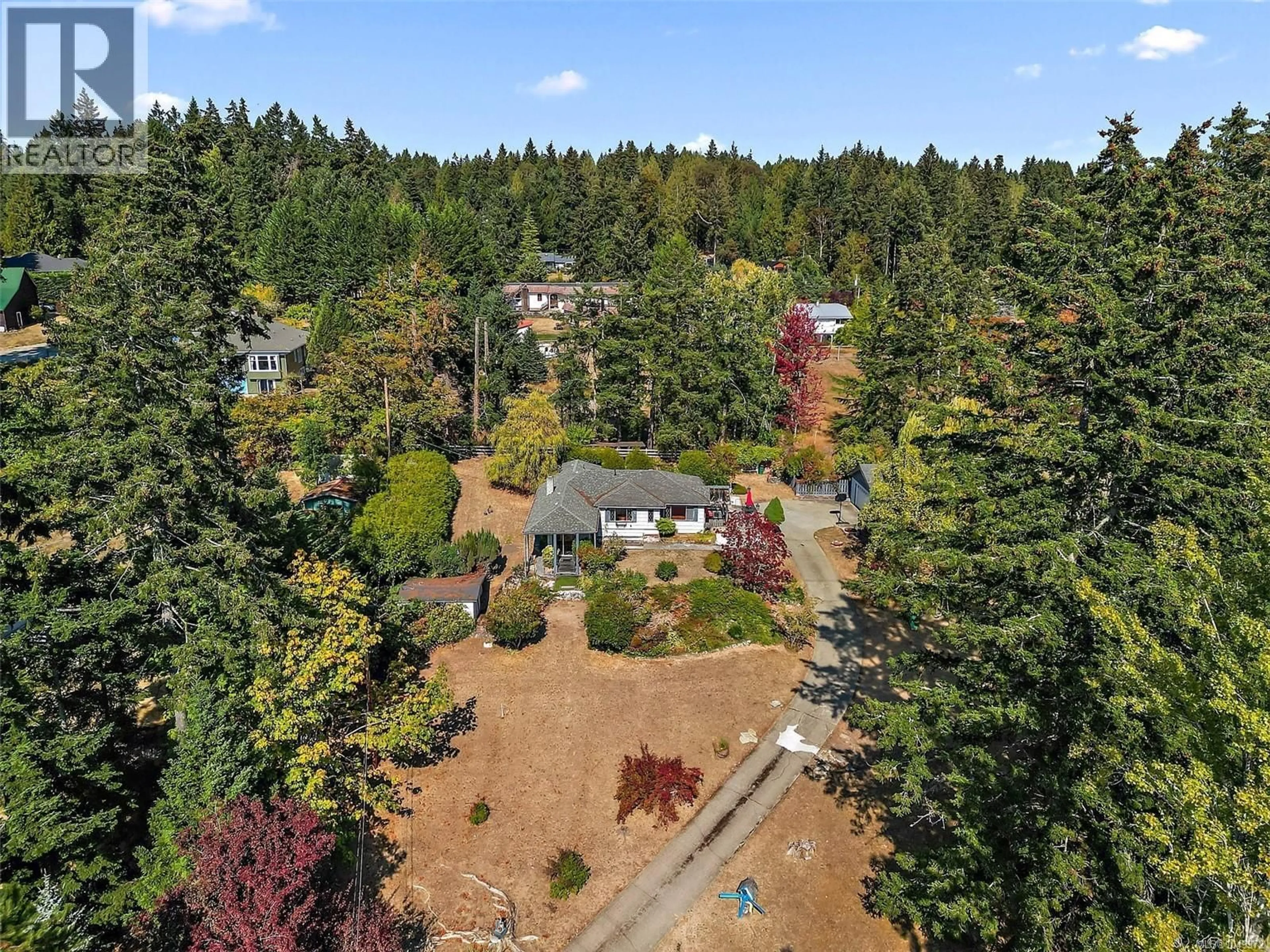 A pic from outside/outdoor area/front of a property/back of a property/a pic from drone, forest/trees view for 675 KILMALU ROAD, Mill Bay British Columbia V8H1E2