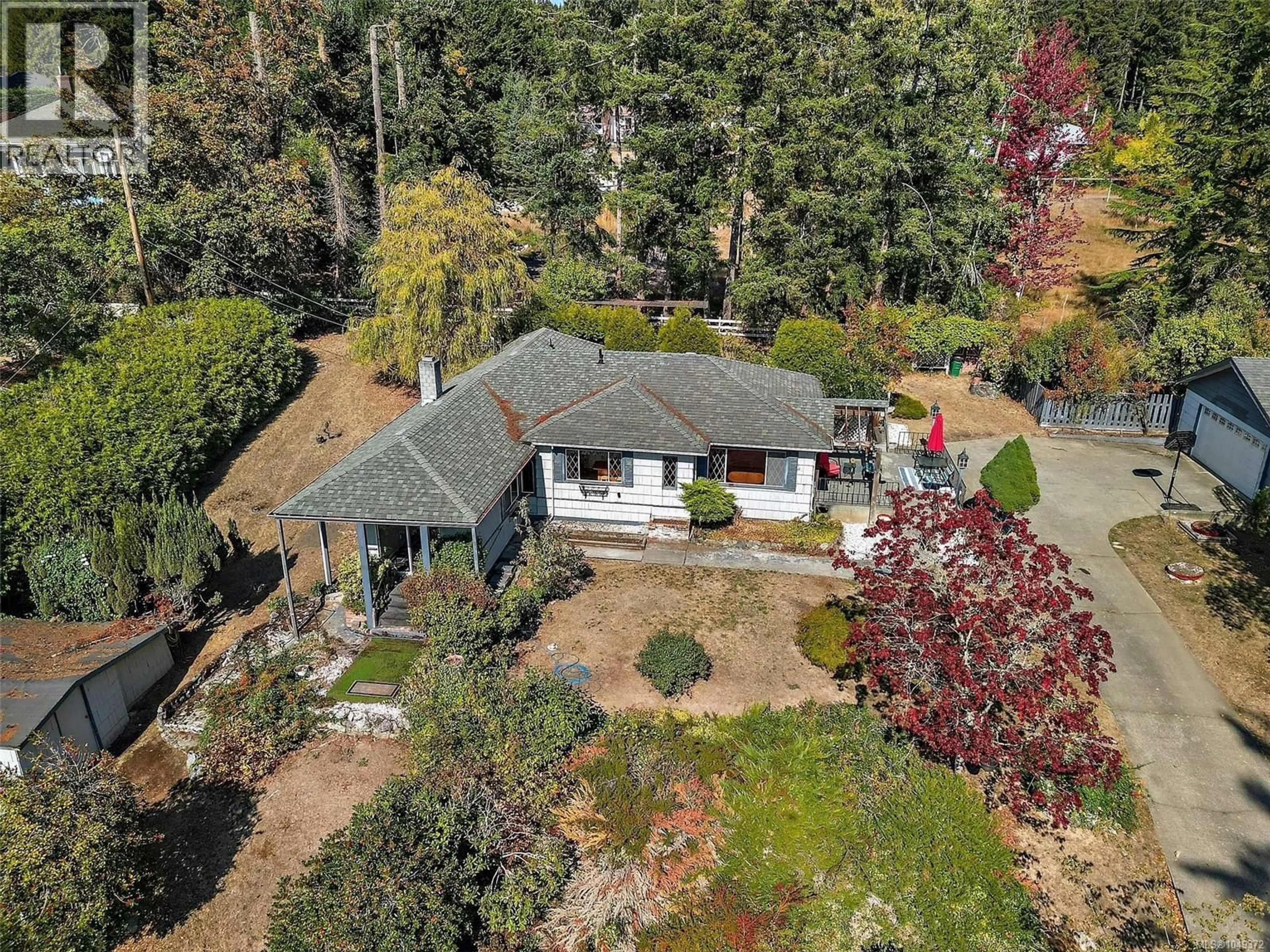 A pic from outside/outdoor area/front of a property/back of a property/a pic from drone, forest/trees view for 675 KILMALU ROAD, Mill Bay British Columbia V8H1E2