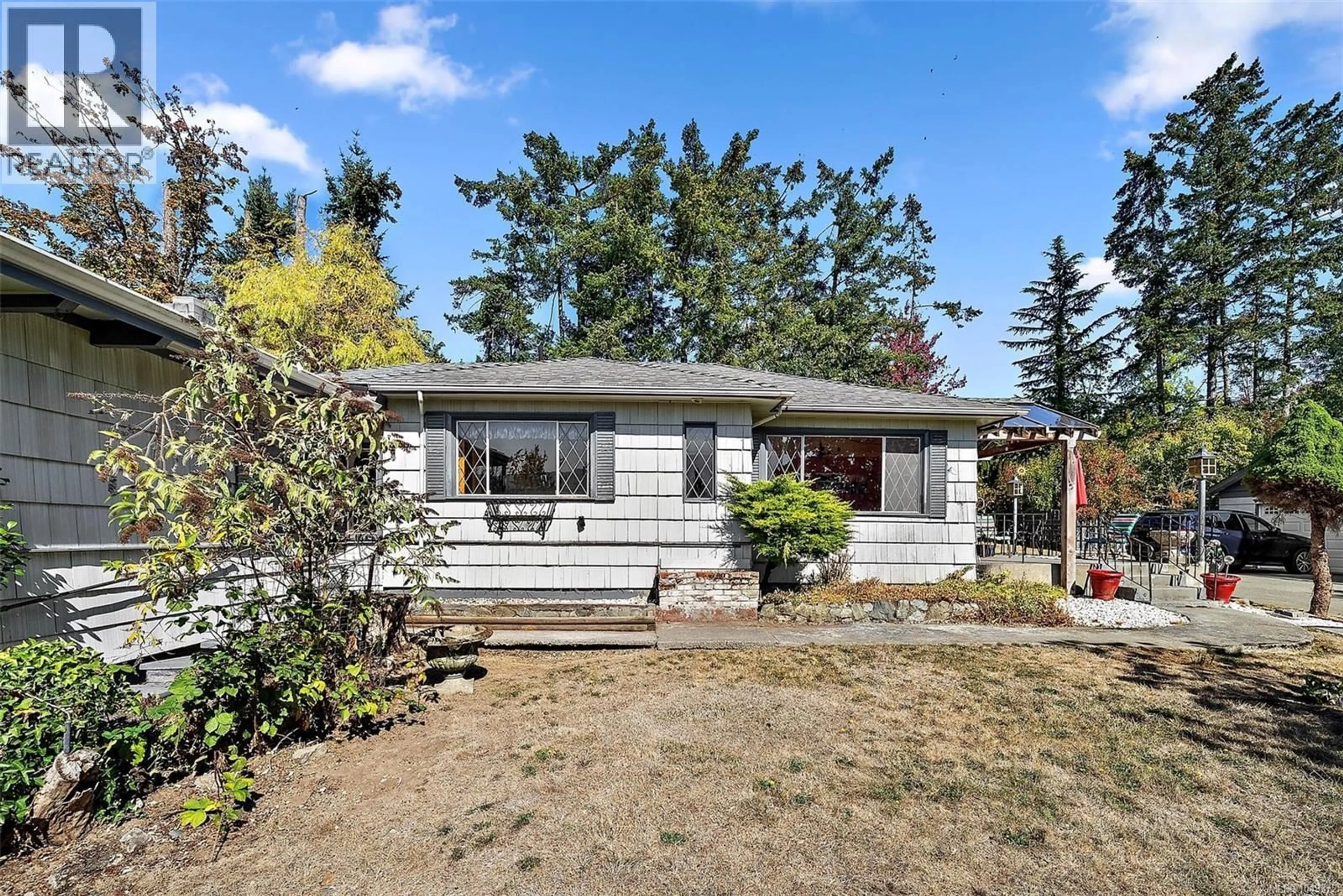 Home with vinyl exterior material, street for 675 KILMALU ROAD, Mill Bay British Columbia V8H1E2
