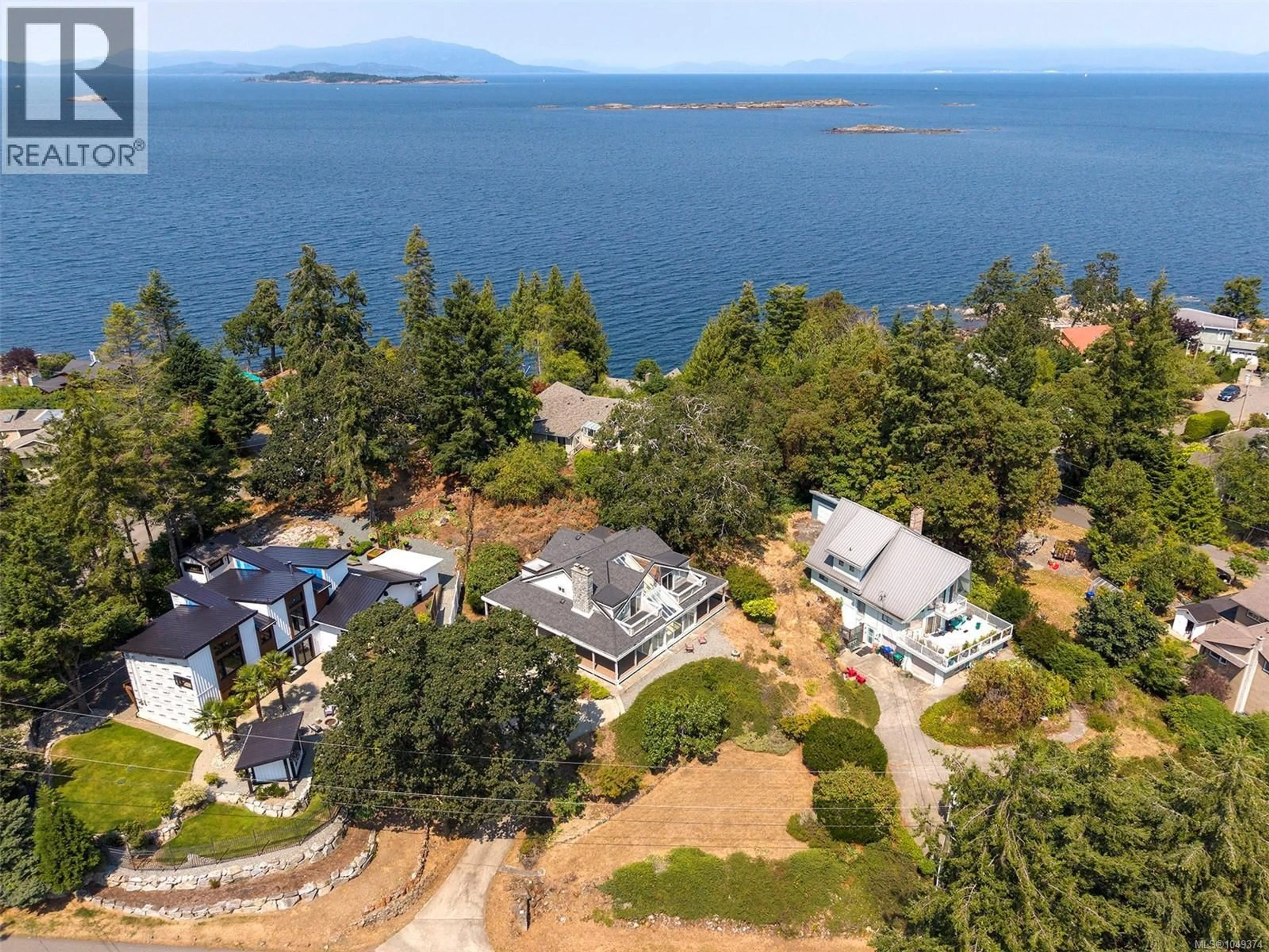 A pic from outside/outdoor area/front of a property/back of a property/a pic from drone, water/lake/river/ocean view for 3481 GRILSE ROAD, Nanoose Bay British Columbia V9P9H8