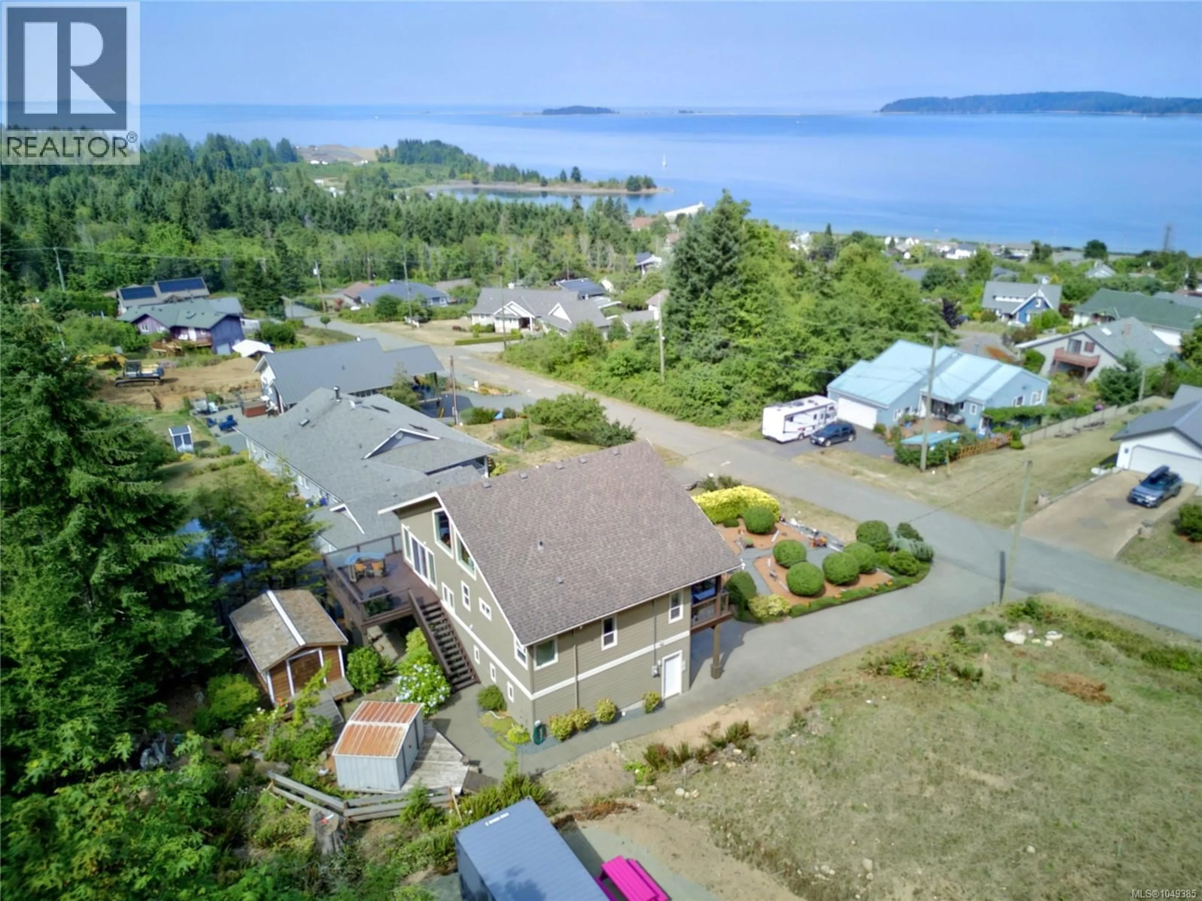 A pic from outside/outdoor area/front of a property/back of a property/a pic from drone, water/lake/river/ocean view for 5633 6TH STREET, Union Bay British Columbia V0R3B0