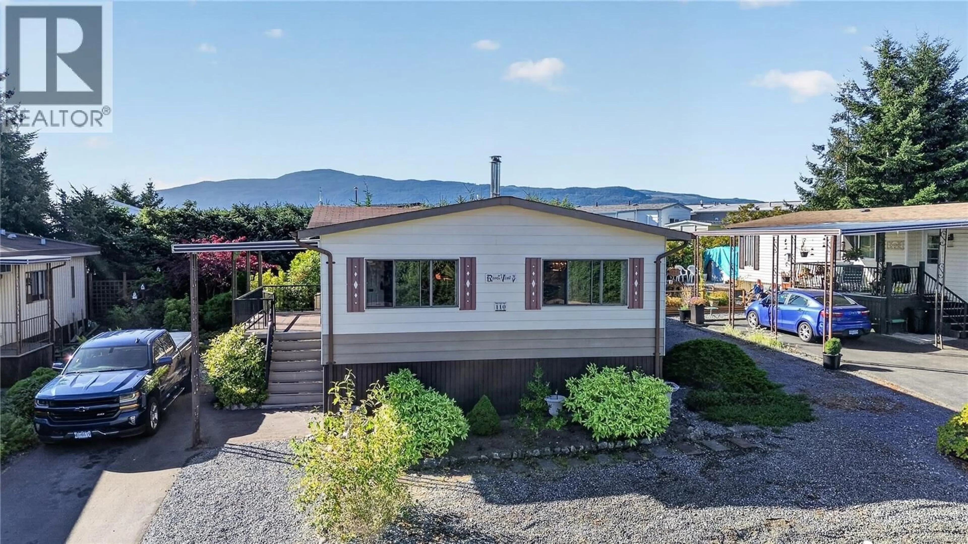 A pic from outside/outdoor area/front of a property/back of a property/a pic from drone, mountain view for 110 - 6325 METRAL DRIVE, Nanaimo British Columbia V9T6P9
