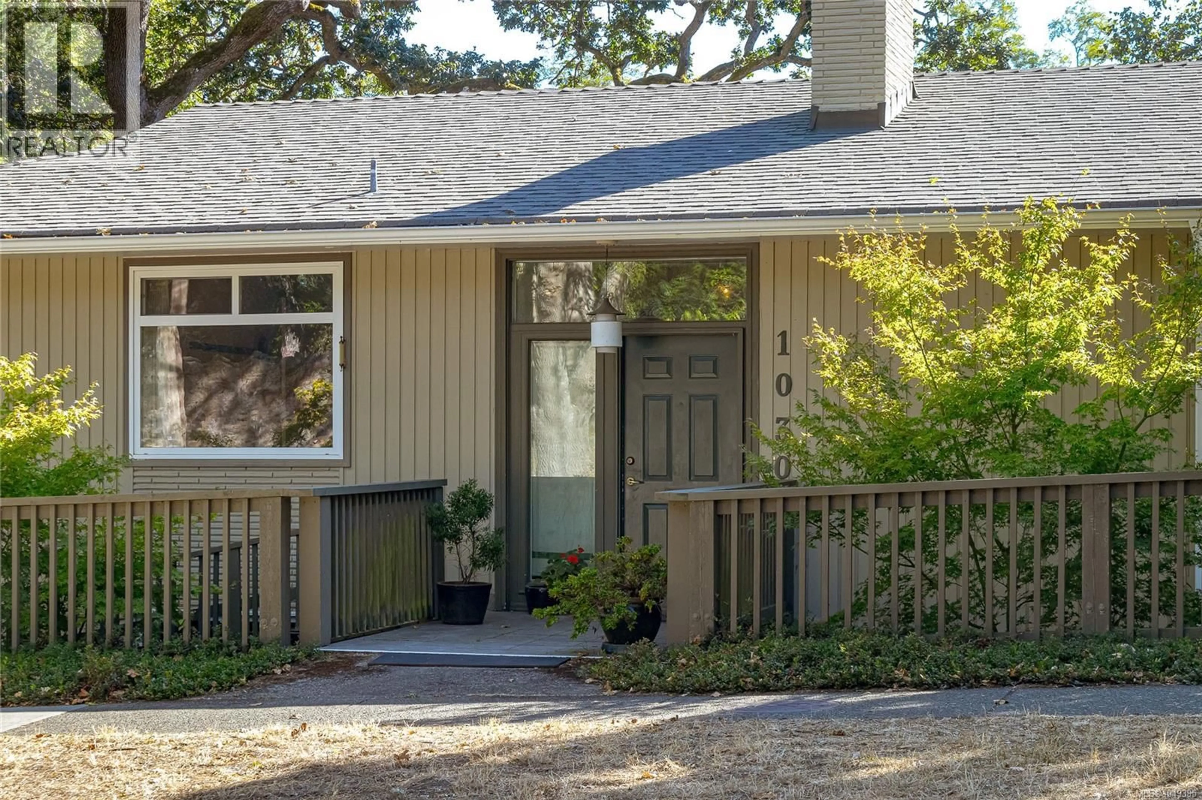 Home with vinyl exterior material, street for 1030 JOAN CRESCENT, Victoria British Columbia V8S3L5
