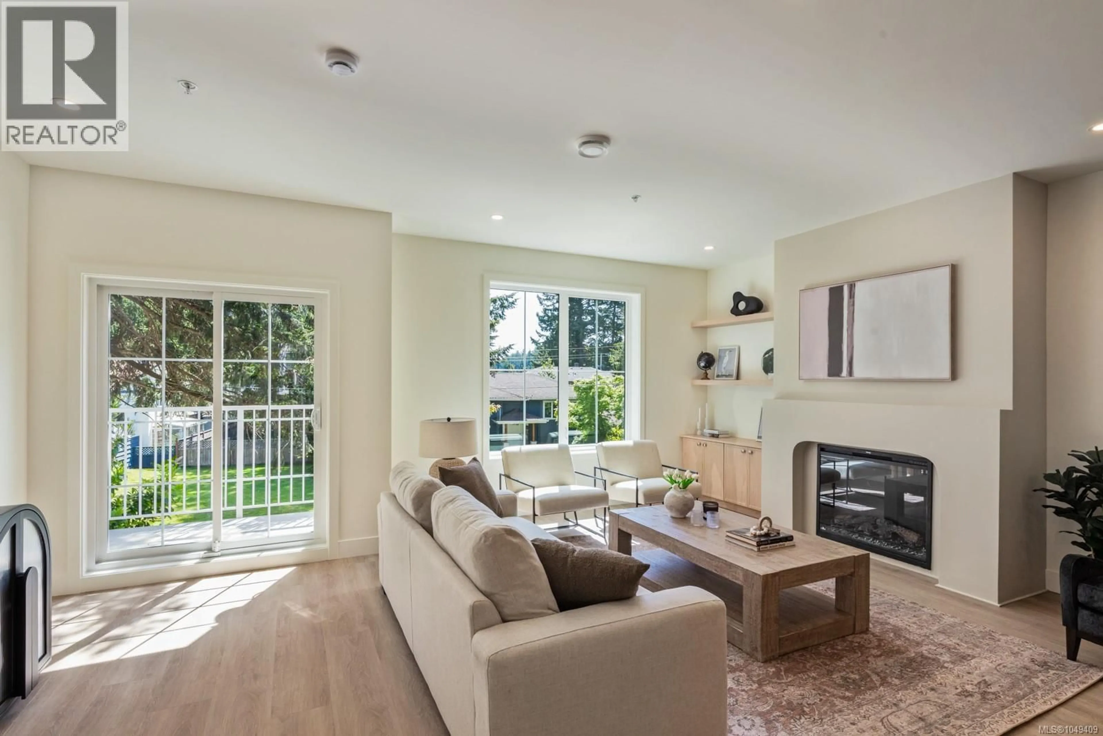 Living room with furniture, ceramic/tile floor for 209 - 2770 VANTILBURG CRESCENT, Langford British Columbia V9B3K4