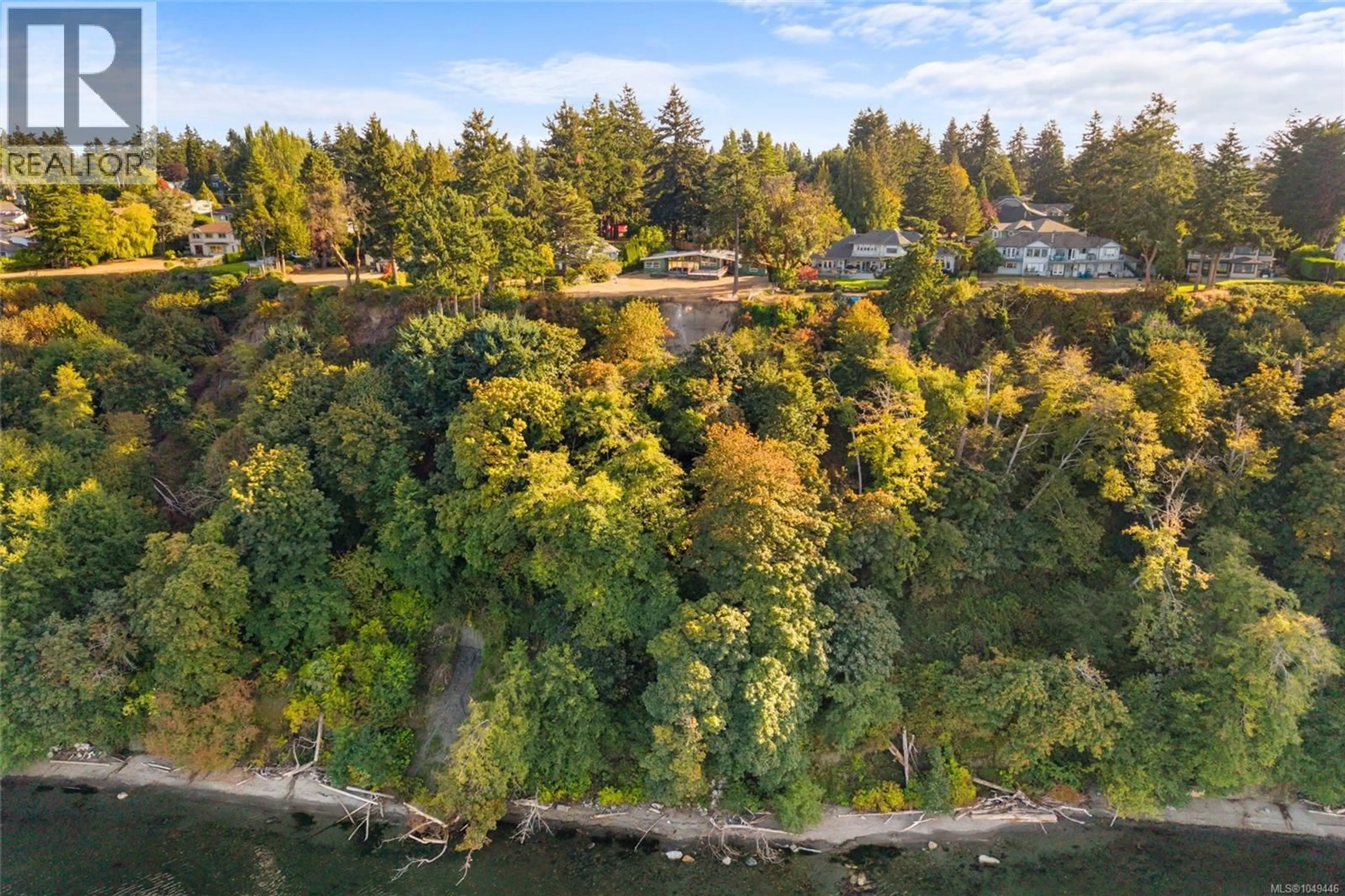 A pic from outside/outdoor area/front of a property/back of a property/a pic from drone, water/lake/river/ocean view for 4598 TORQUAY DRIVE, Saanich British Columbia V8N3L7